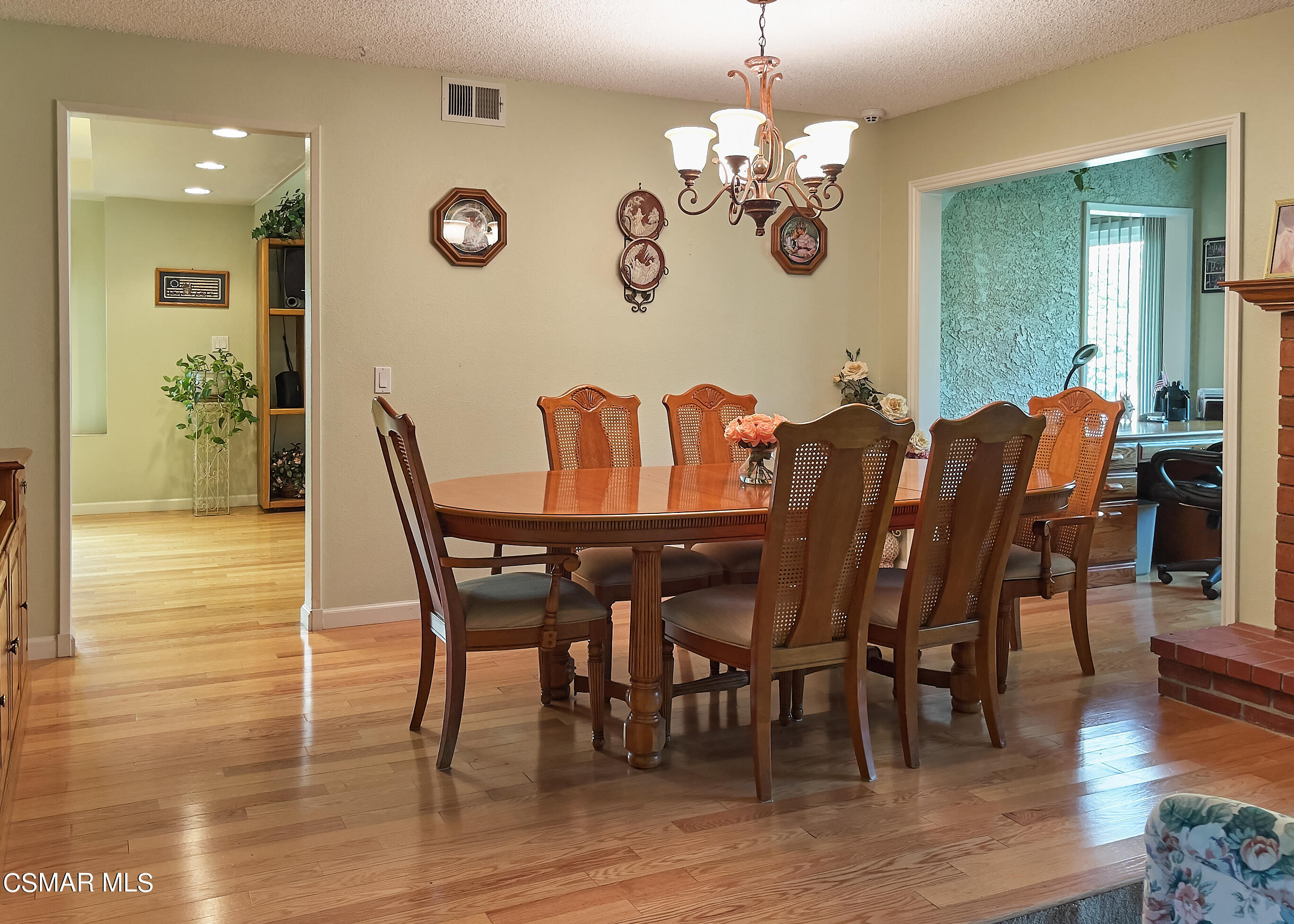 4110 Oakcliff Drive Moorpark, CA 93021 - Photo 22 of 67 a view of a dining room with furniture and wooden floor