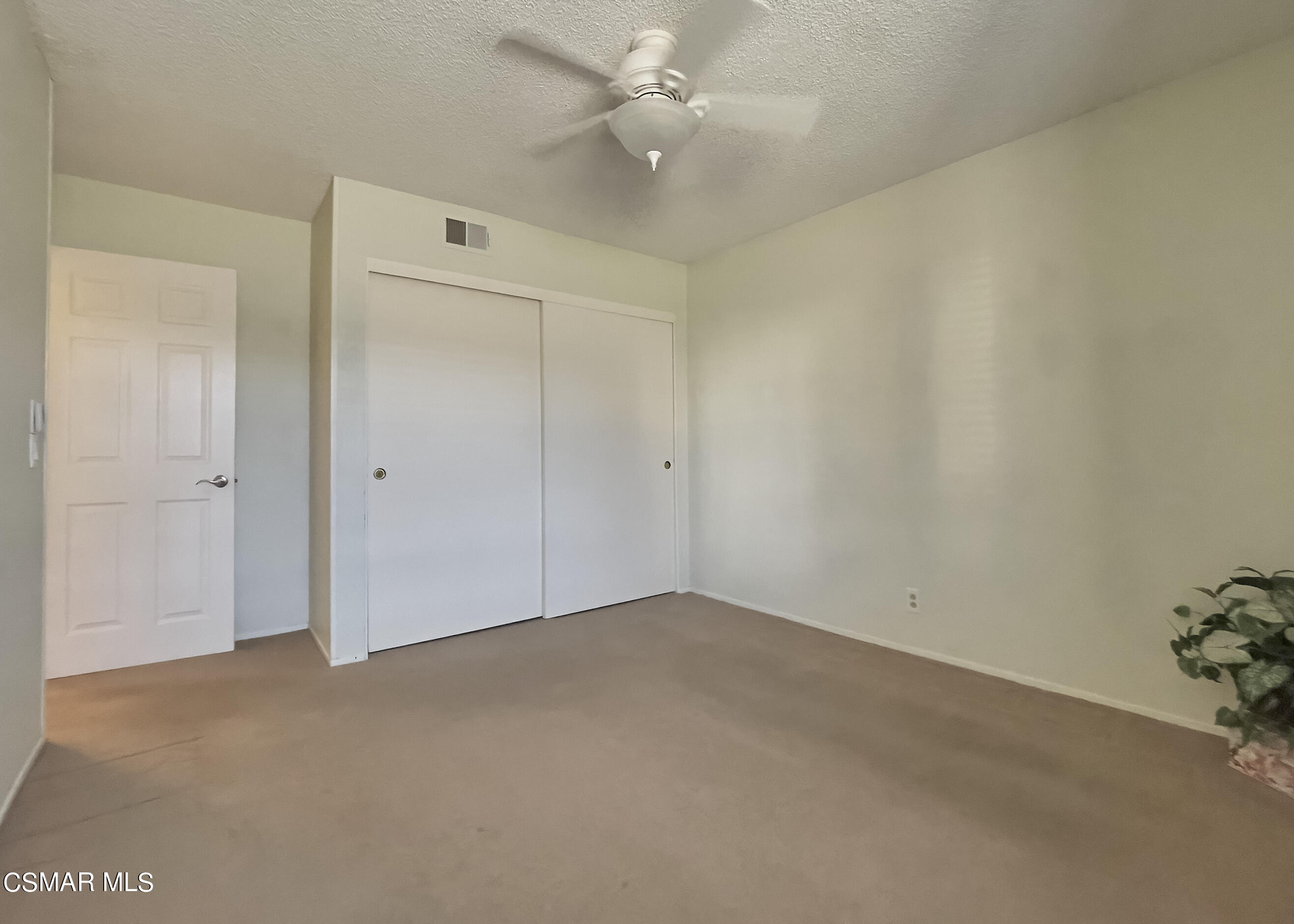 4110 Oakcliff Drive Moorpark, CA 93021 - Photo 53 of 67 an empty room with a ceiling fan and a window