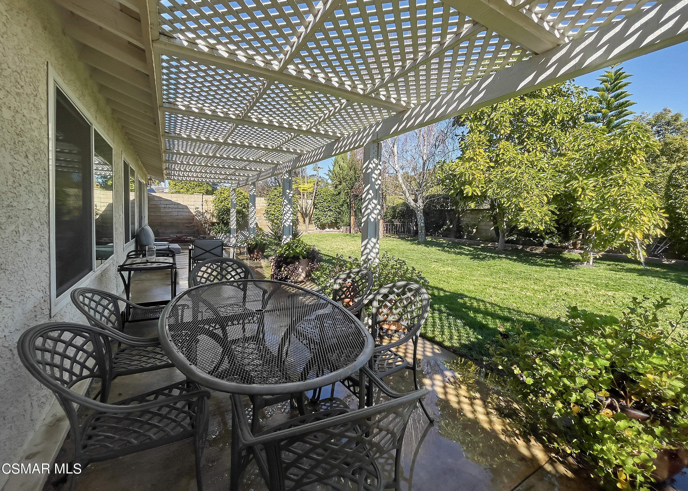 4110 Oakcliff Drive Moorpark, CA 93021 - Photo 60 of 67 a view of a chairs and table in backyard