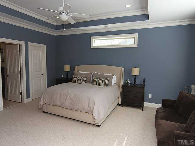 12924 Edsel Drive Raleigh, NC 27613 - Photo 11 of 25 Step into luxury with this roomy yet cozy master suite! Notice the features of the trey ceiling,and extra crown moldings. Plenty of room in here for a couple of chairs or a sofa. Truly a retreat! Master Suite