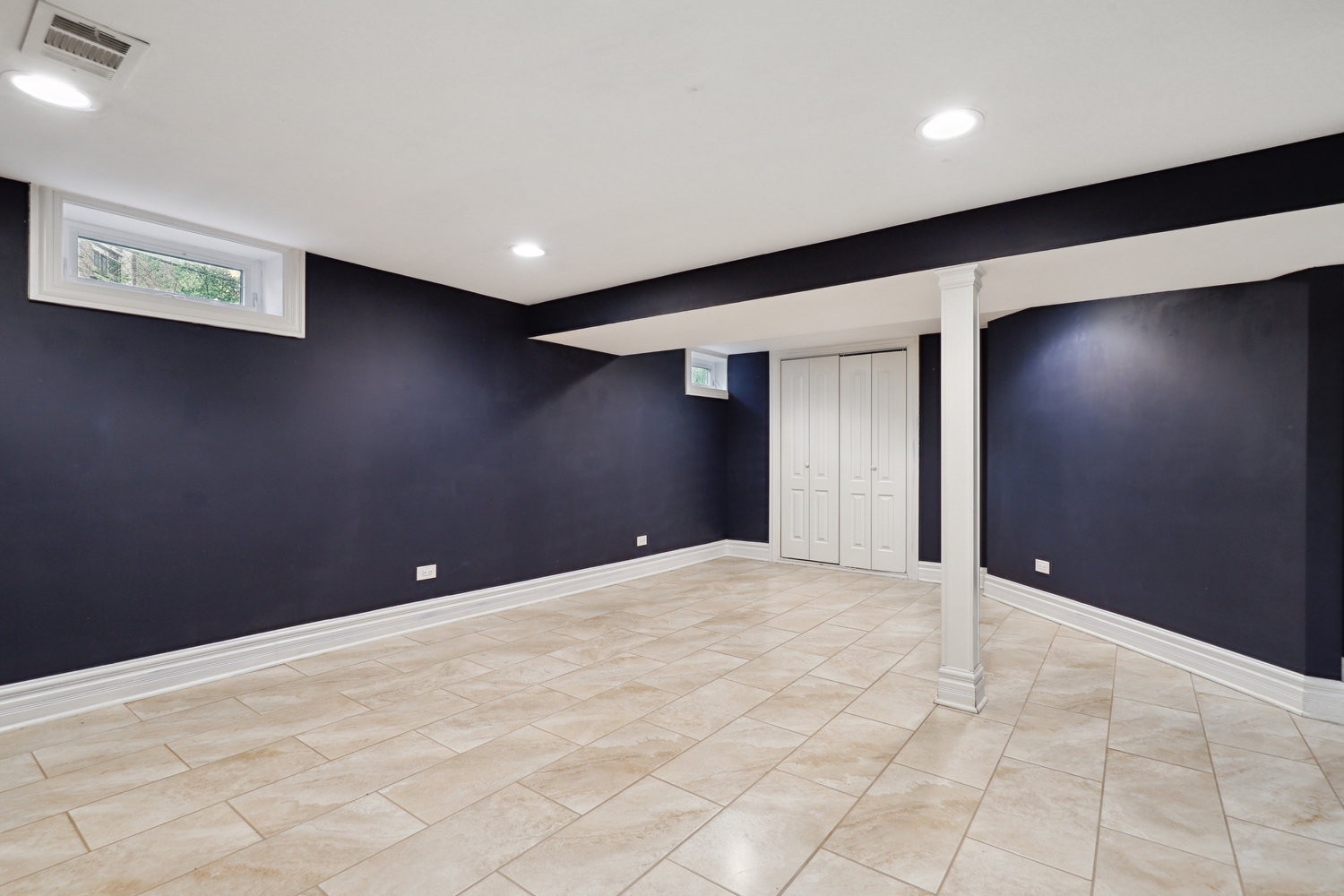 5932 107th Place Chicago Ridge, IL 60415 - Photo 17 of 22 a view of an empty room with wooden floor and a window
