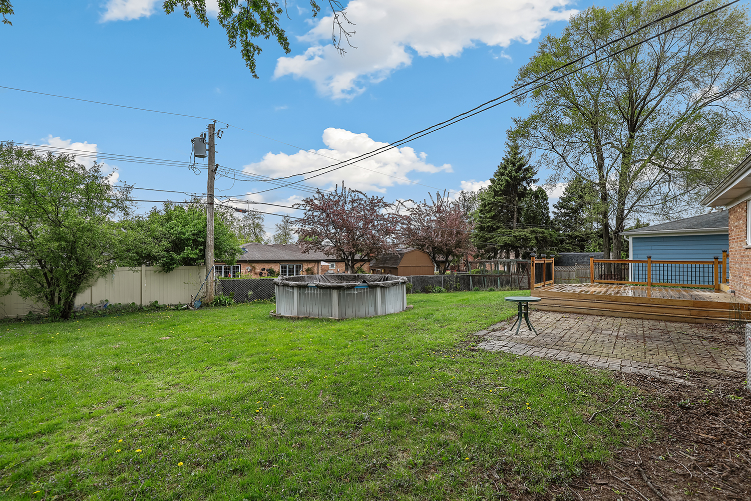 5932 107th Place Chicago Ridge, IL 60415 - Photo 21 of 22 a view of a house with backyard and sitting area