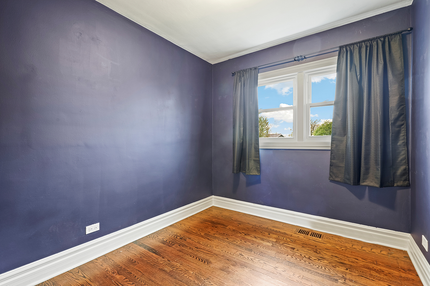 5932 107th Place Chicago Ridge, IL 60415 - Photo 8 of 22 a view of empty room with wooden floor and fan