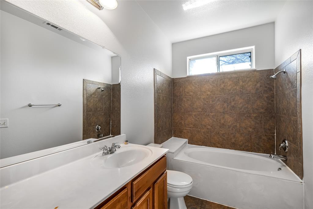 2518 Allred Drive, Unit A Austin, TX 78748 - Photo 8 of 16 Full bathroom featuring shower combination and vanity
