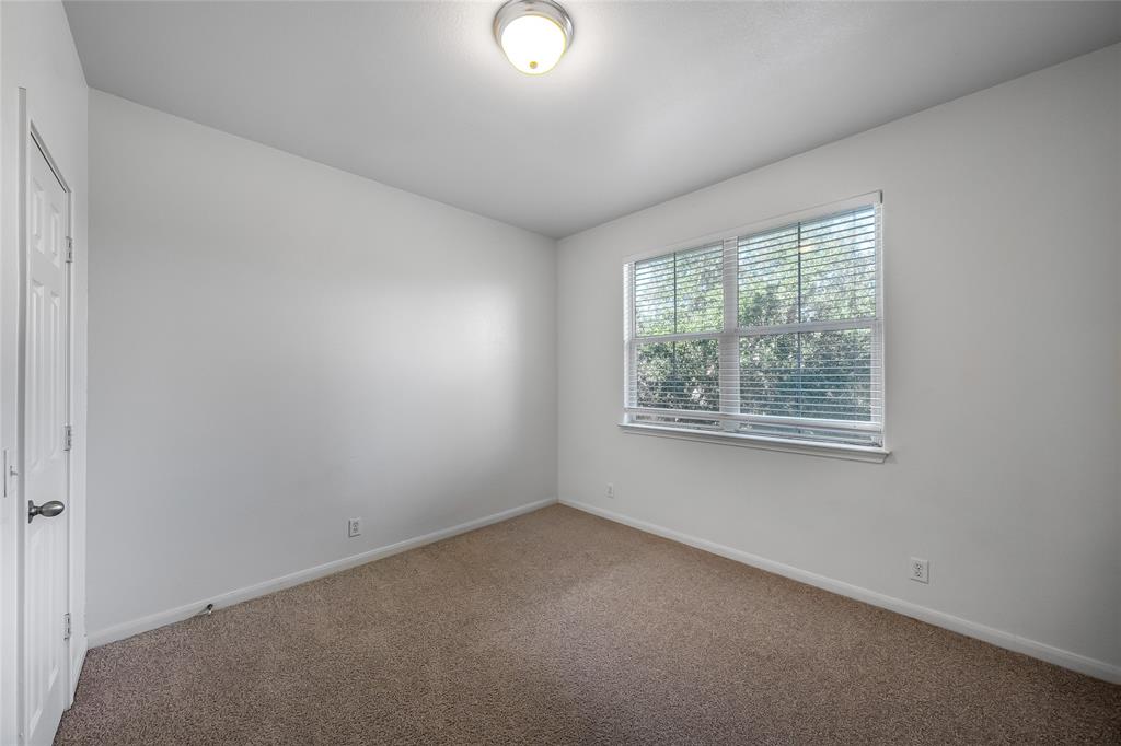 2518 Allred Drive, Unit A Austin, TX 78748 - Photo 10 of 16 Carpeted spare room with baseboards