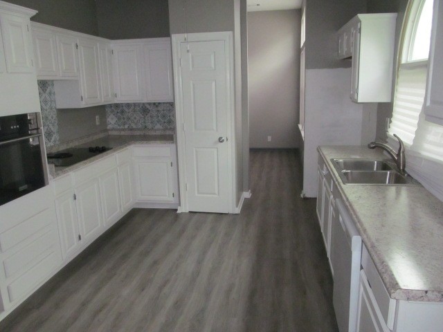 4740 Billingsgate Road Antioch, TN 37013 - Photo 3 of 5 a kitchen with granite countertop a sink stove and cabinets