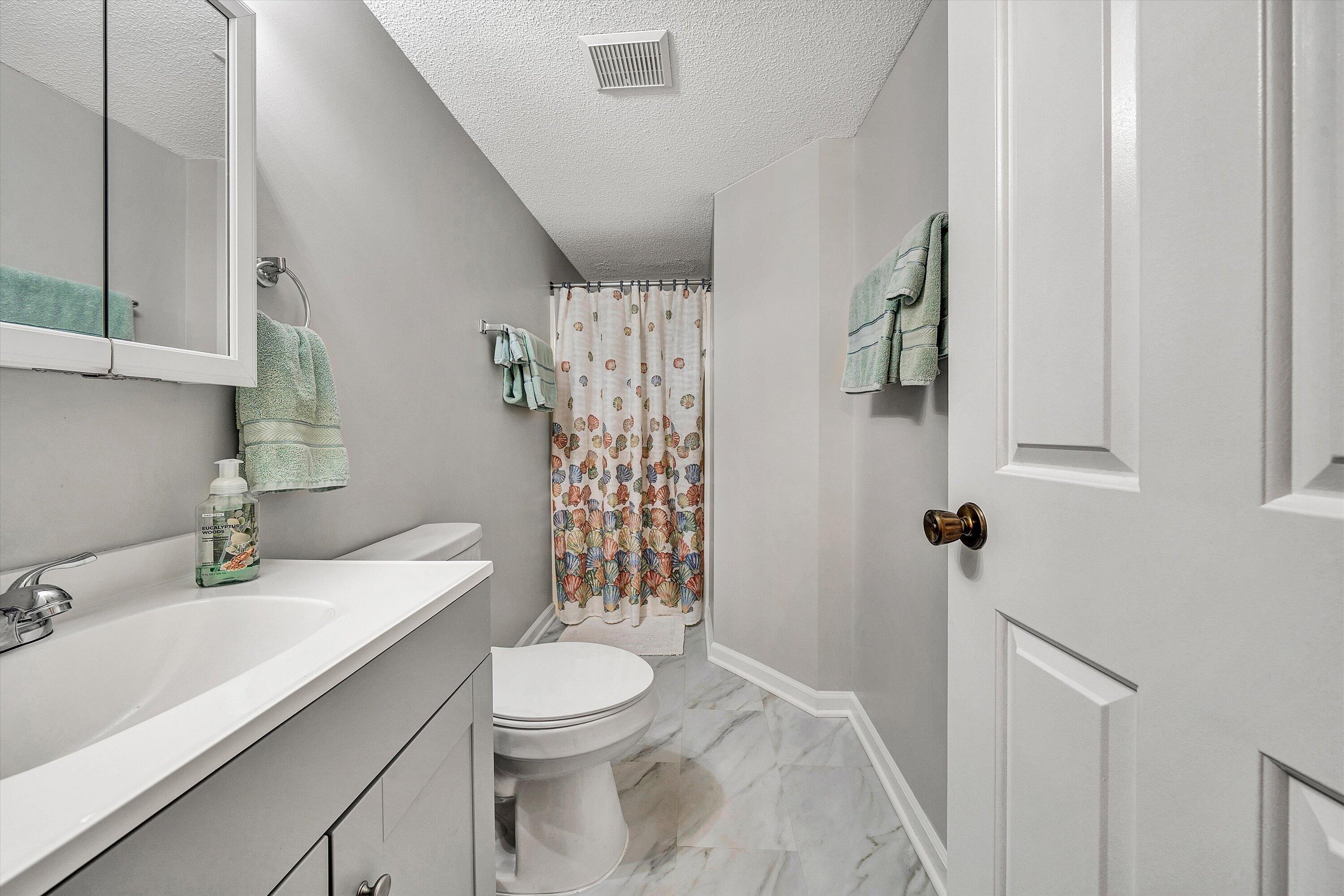 620 Monte Vista Road, Unit 605 Union Hall, VA 24176 - Photo 22 of 41 a bathroom with a sink toilet and shower