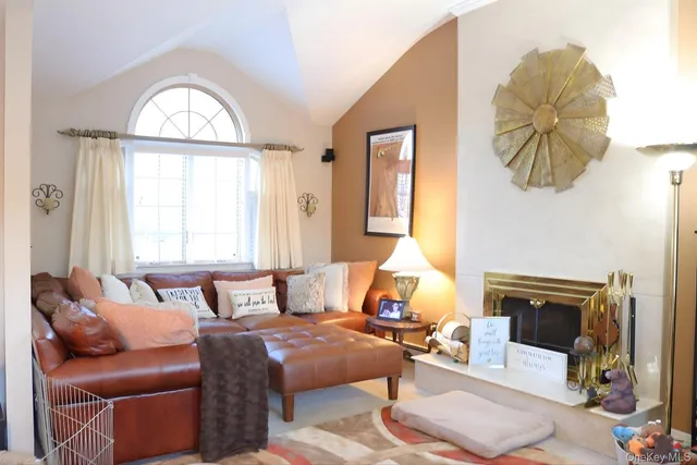 a bedroom with a bed and a fireplace