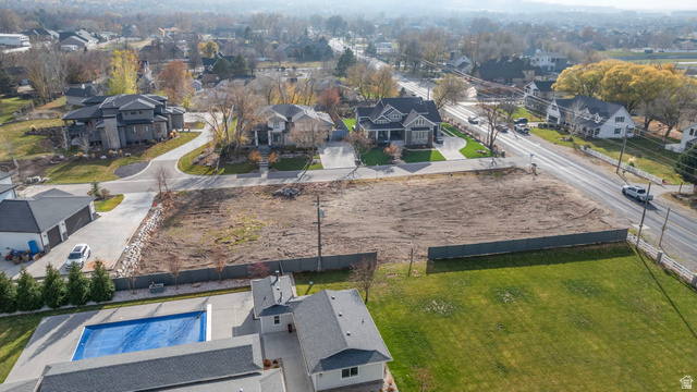 12959 South Fort Street Draper, UT 84020 - Photo 4 of 20 Aerial perspective of suburban area with a pool