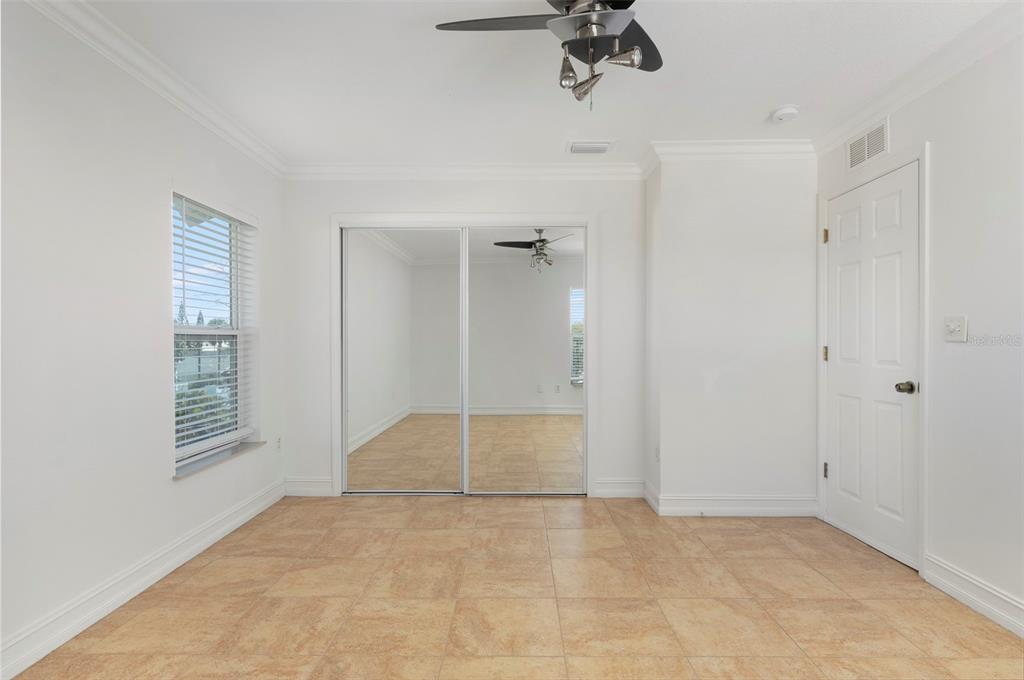 114 143rd Avenue, Unit B Madeira Beach, FL 33708 - Photo 7 of 14 wooden floor in an empty room