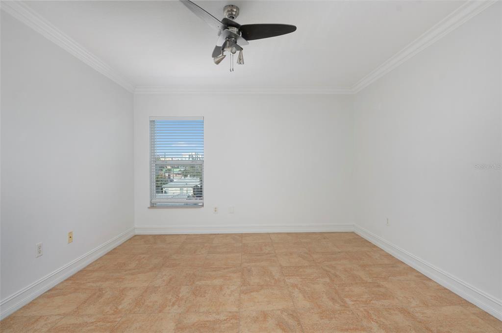 114 143rd Avenue, Unit B Madeira Beach, FL 33708 - Photo 8 of 14 wooden floor in an empty room