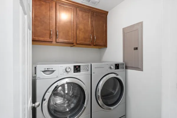 a utility room with dryer and washer