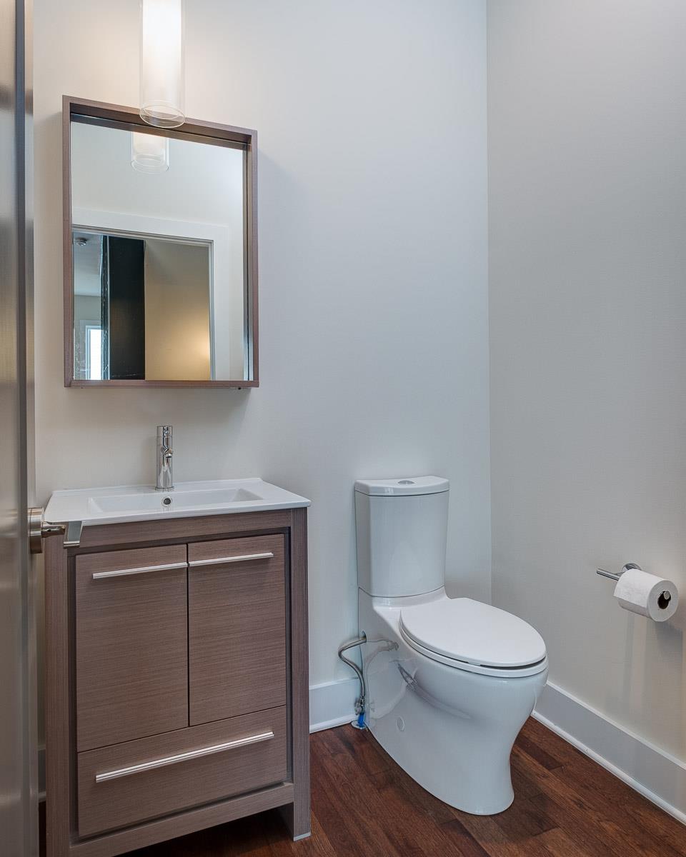 2106 9th Avenue North, Unit 3 Nashville, TN 37228 - Photo 15 of 30 a bathroom with a toilet a sink and mirror