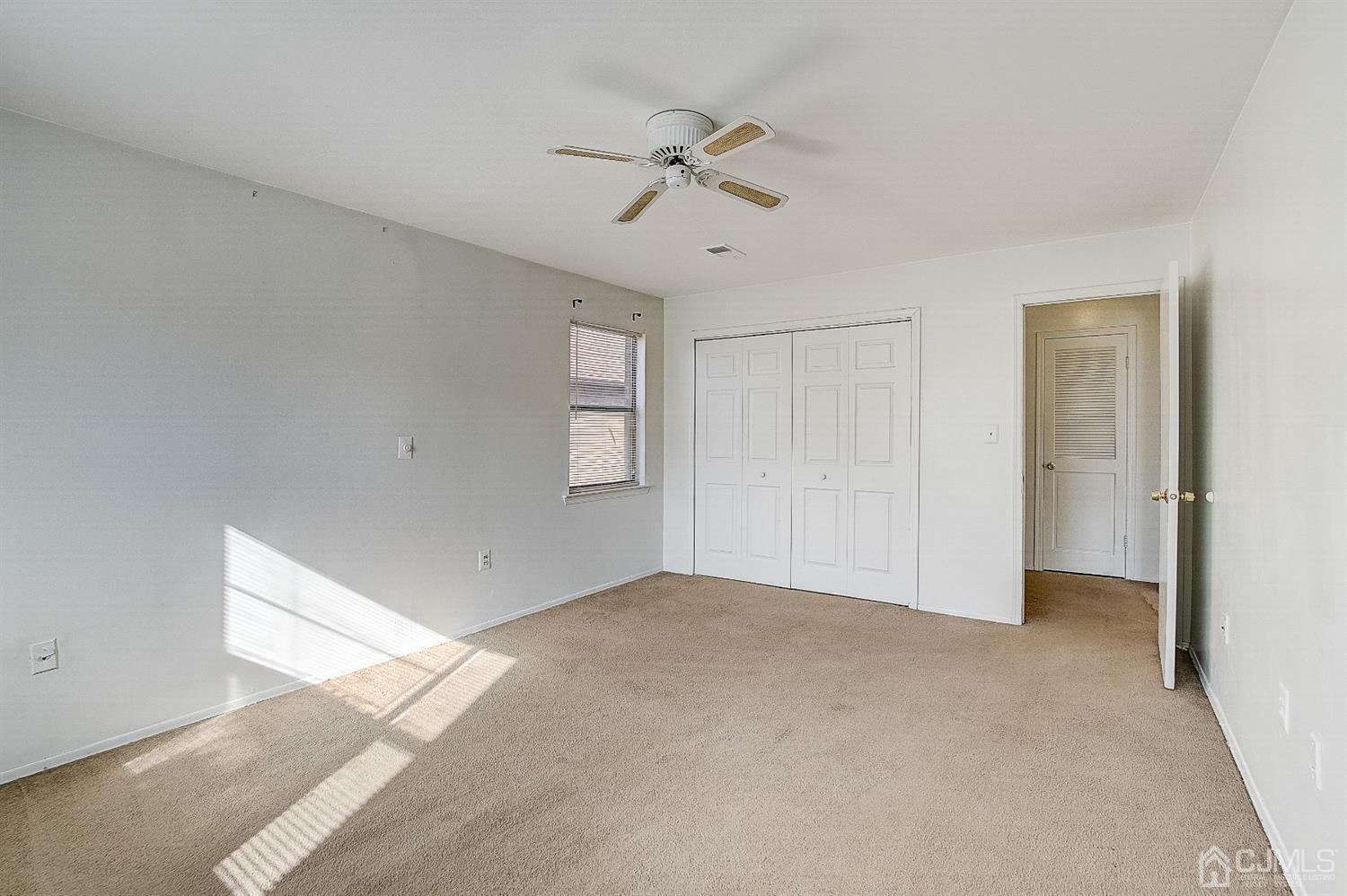1508 Raspberry Court Edison, NJ 08817 - Photo 12 of 20 a view of an empty room with a window