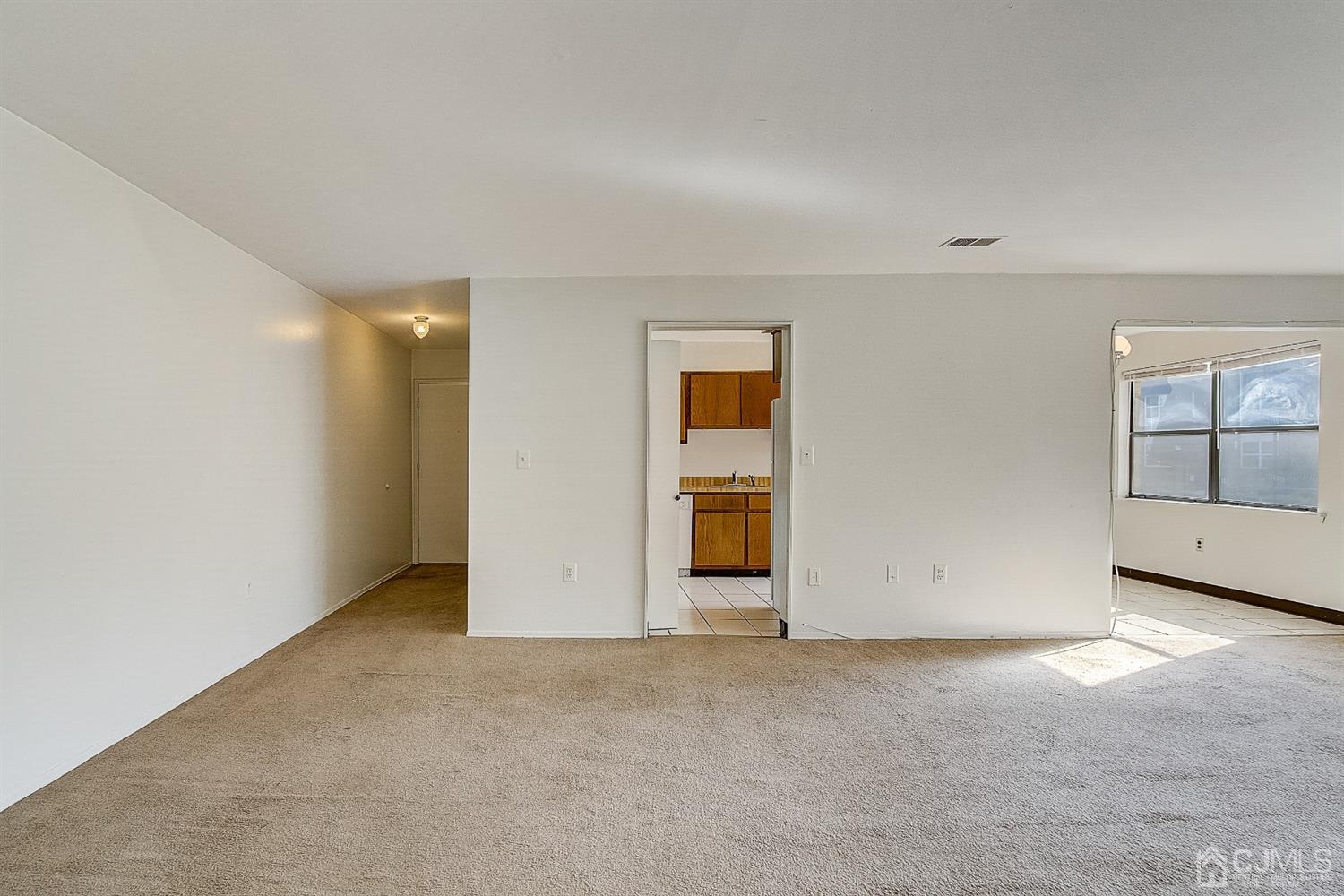 1508 Raspberry Court Edison, NJ 08817 - Photo 15 of 20 an empty room with windows