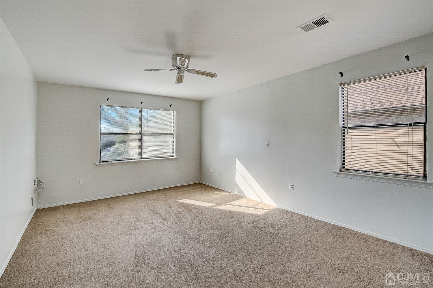 1508 Raspberry Court Edison, NJ 08817 - Photo 10 of 20 a view of an empty room with a window