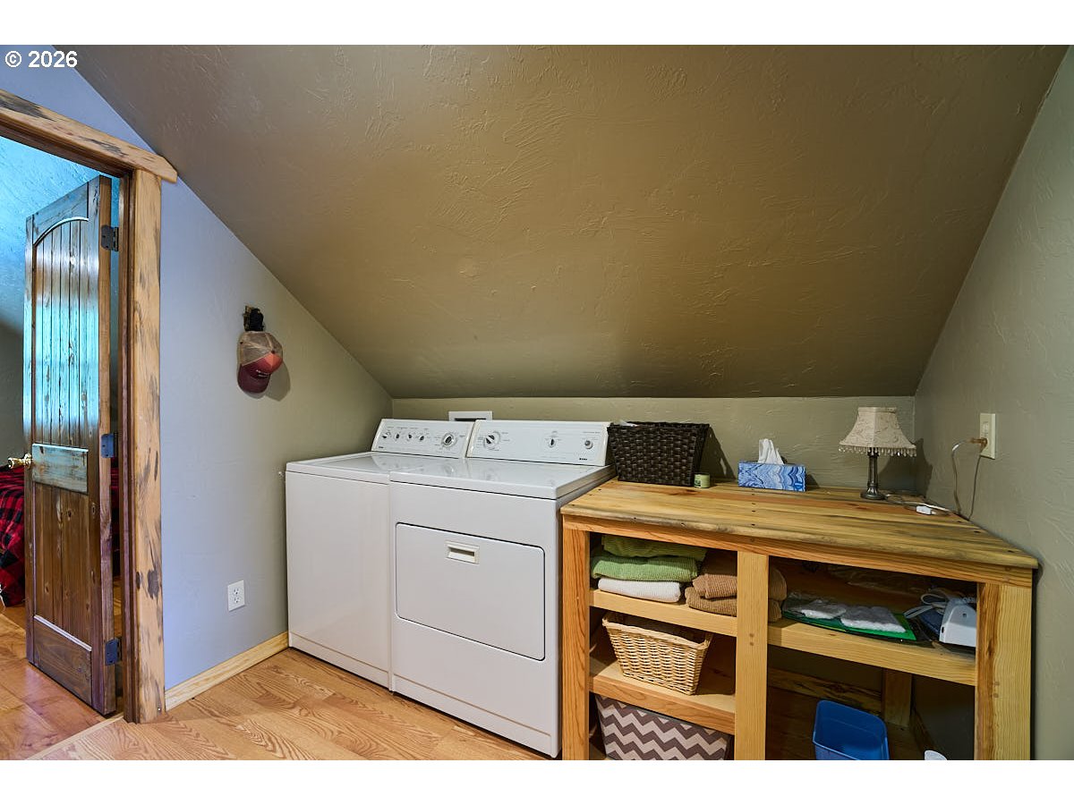 61718 Chief Joseph Loop Road Joseph, OR 97846 - Photo 15 of 38 a utility room with dryer and washer