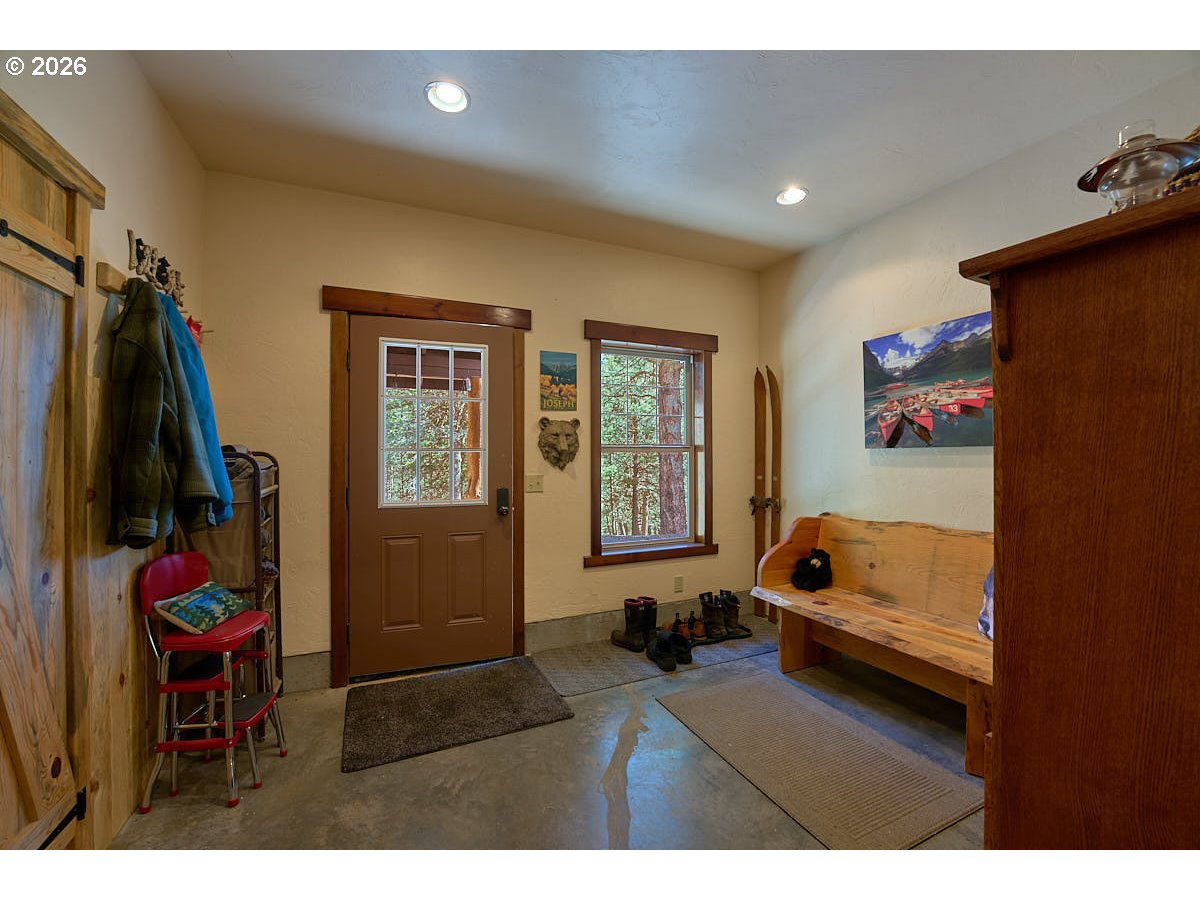 61718 Chief Joseph Loop Road Joseph, OR 97846 - Photo 2 of 38 a living room with furniture and a window