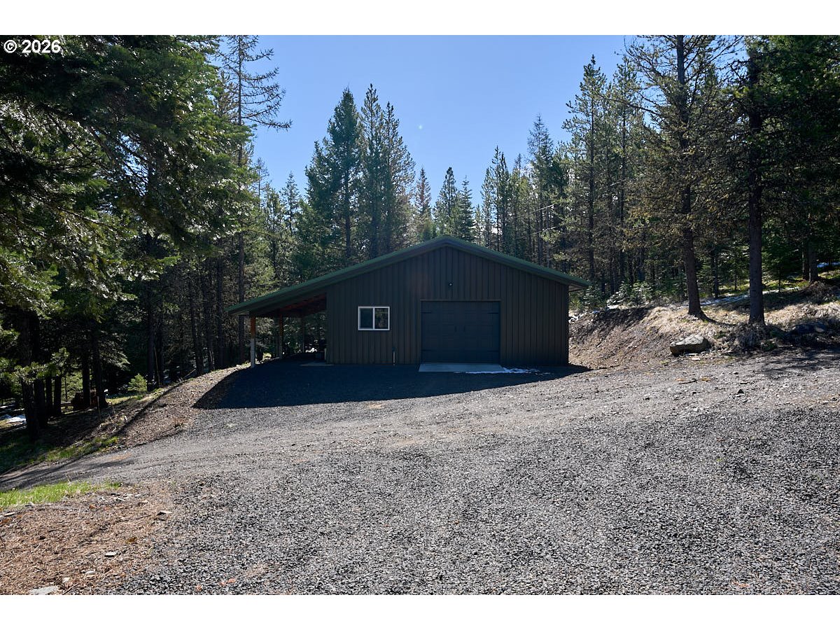 61718 Chief Joseph Loop Road Joseph, OR 97846 - Photo 24 of 38 a house view with a outdoor space