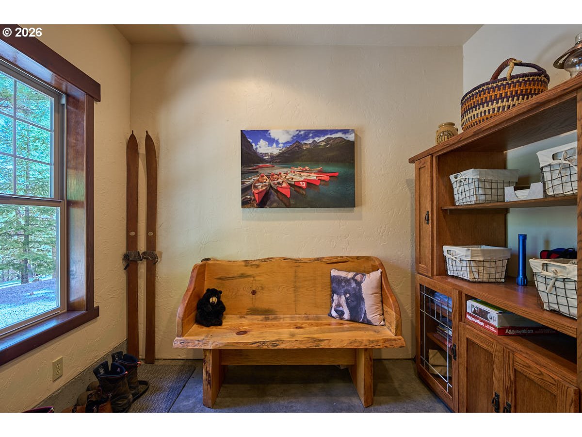 61718 Chief Joseph Loop Road Joseph, OR 97846 - Photo 3 of 38 a view of a bedroom with furniture and a window