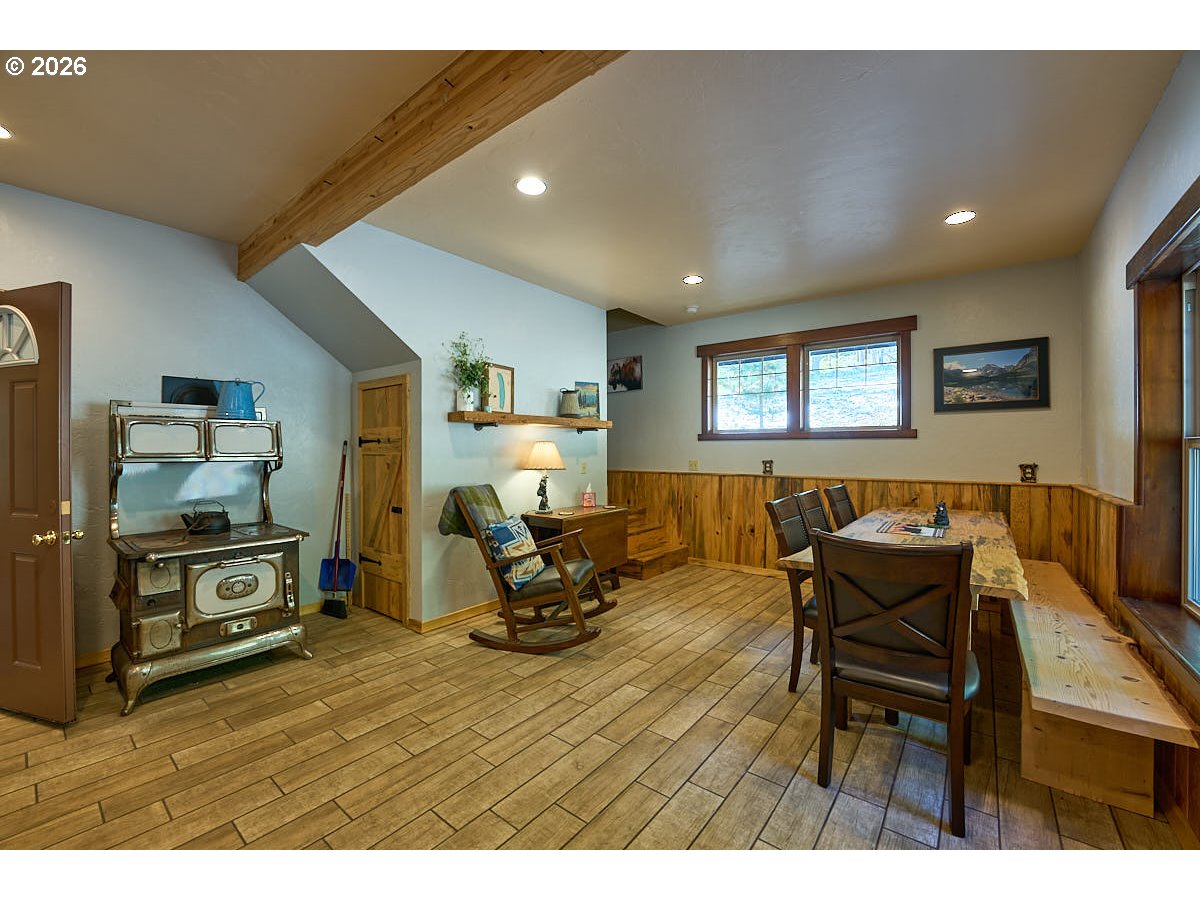 61718 Chief Joseph Loop Road Joseph, OR 97846 - Photo 9 of 38 a living room with furniture and a flat screen tv