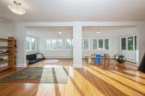 a view of a living room and dining room