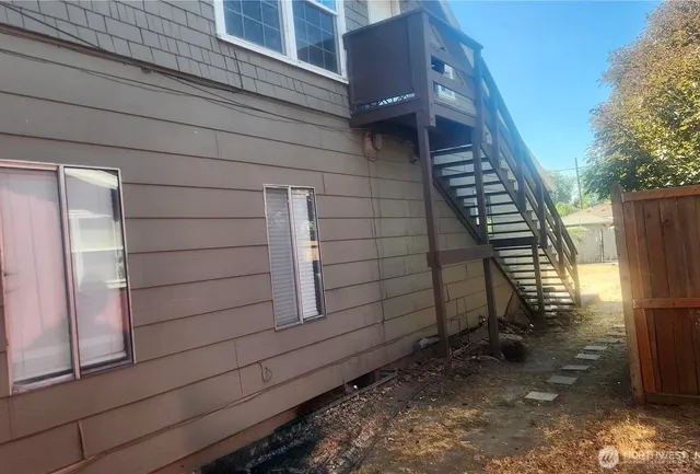 a view of a room that has a window