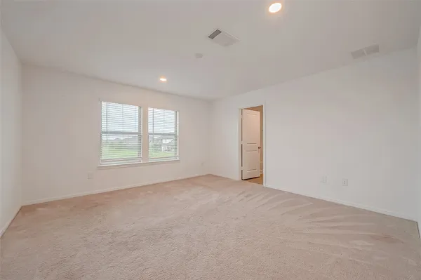 a spacious bathroom with a tub shower vanity and a sink