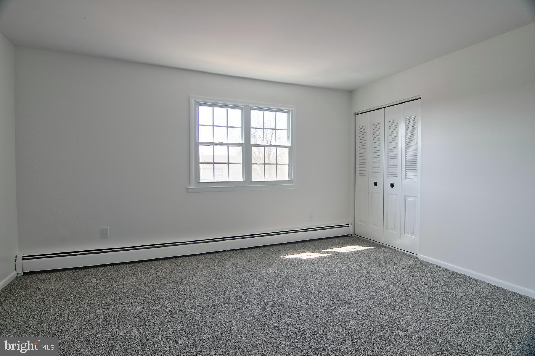 2705 Walnut Ridge Drive Pottstown, PA 19464 - Photo 13 of 27 an empty room with windows