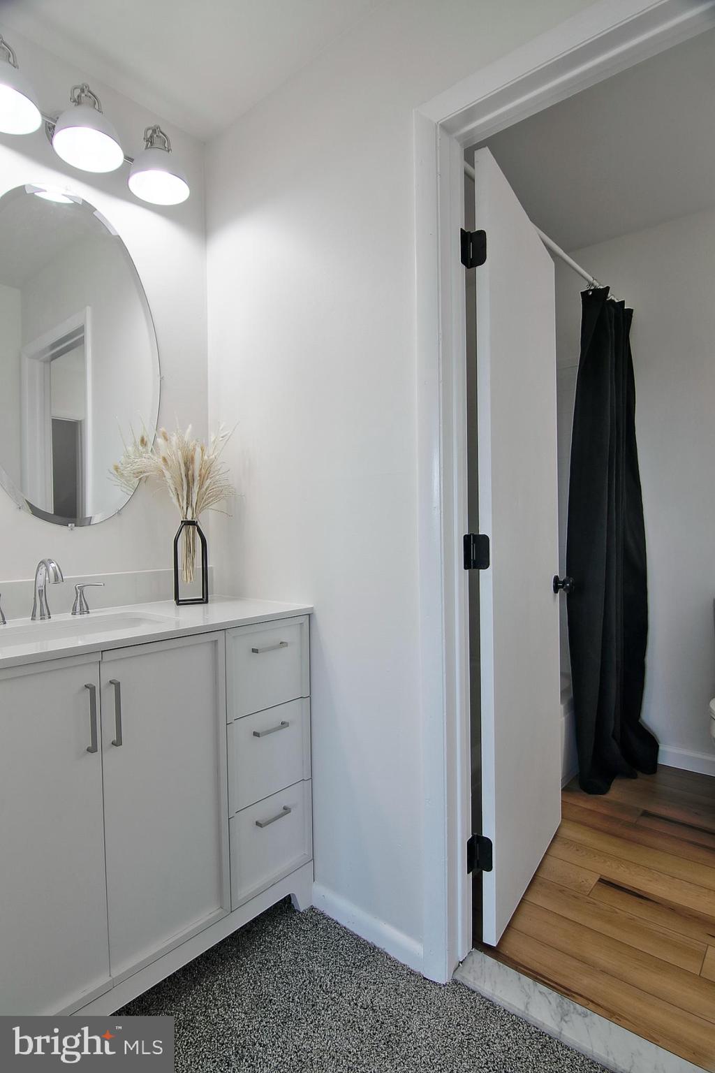 2705 Walnut Ridge Drive Pottstown, PA 19464 - Photo 16 of 27 a bathroom with a double vanity sink and mirror