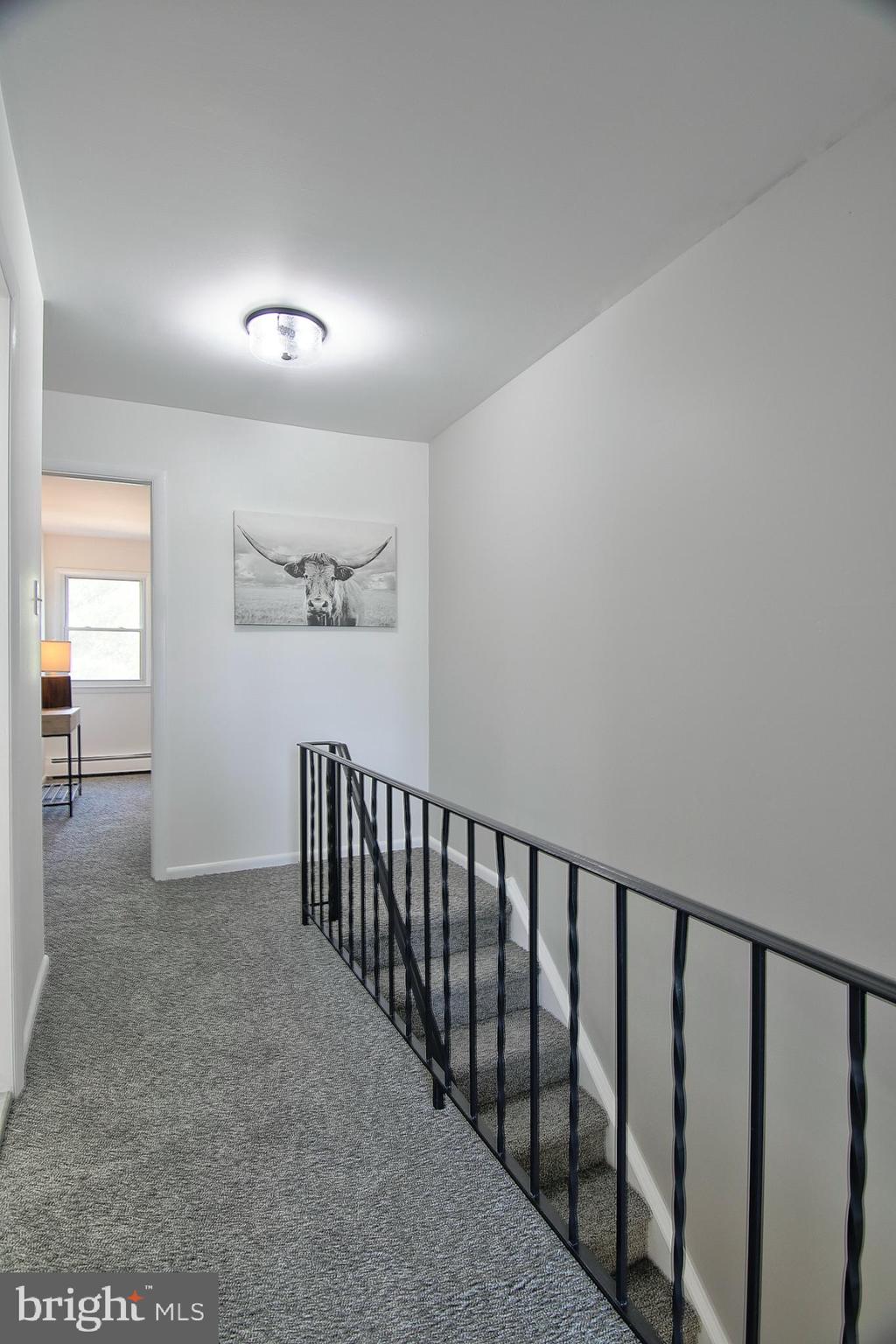 2705 Walnut Ridge Drive Pottstown, PA 19464 - Photo 18 of 27 a view of hallway with stairs