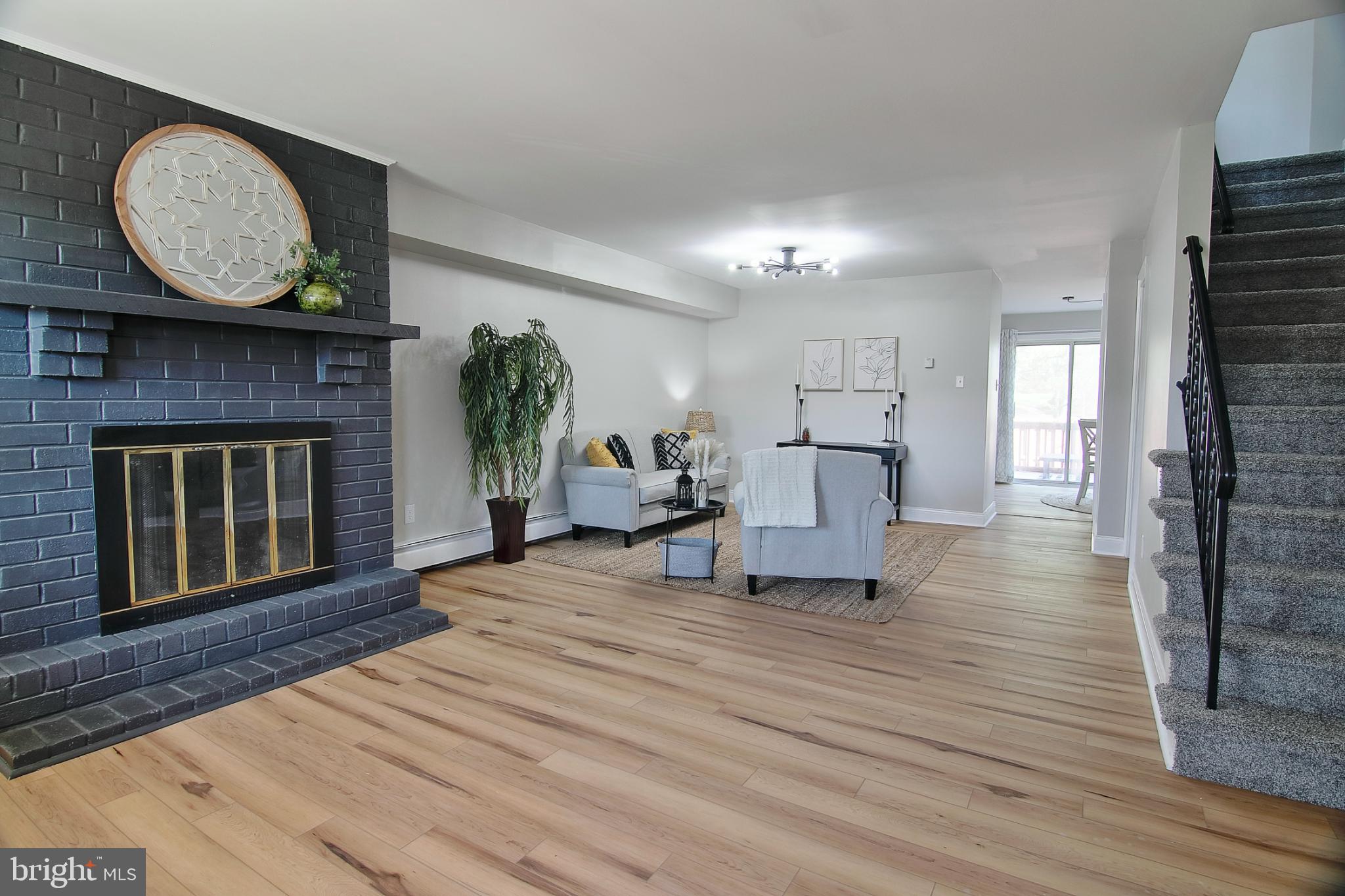 2705 Walnut Ridge Drive Pottstown, PA 19464 - Photo 6 of 27 a living room with furniture and a fireplace