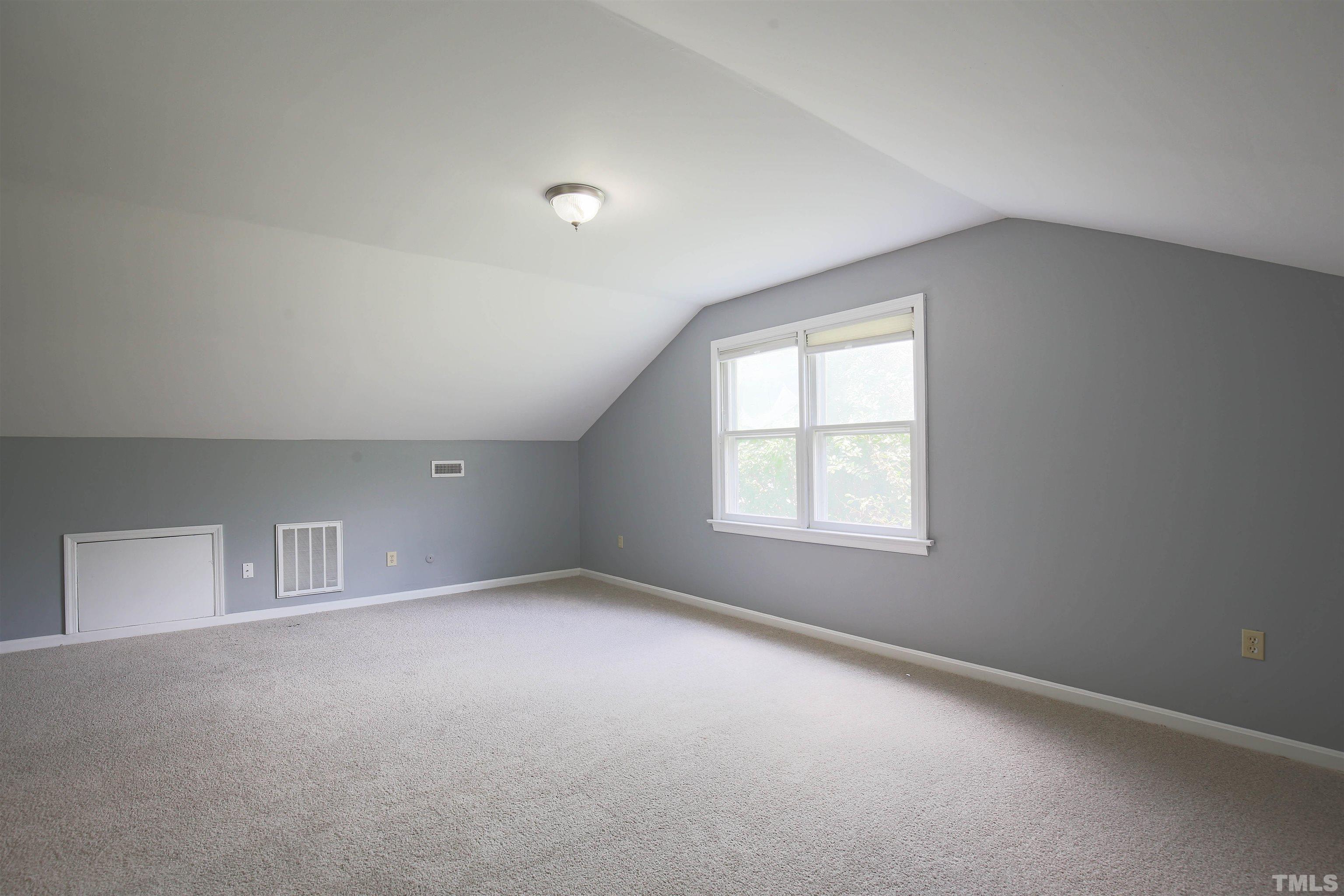 1507 Clermont Road, Unit T23 Durham, NC 27713 - Photo 11 of 24 an empty room with a window