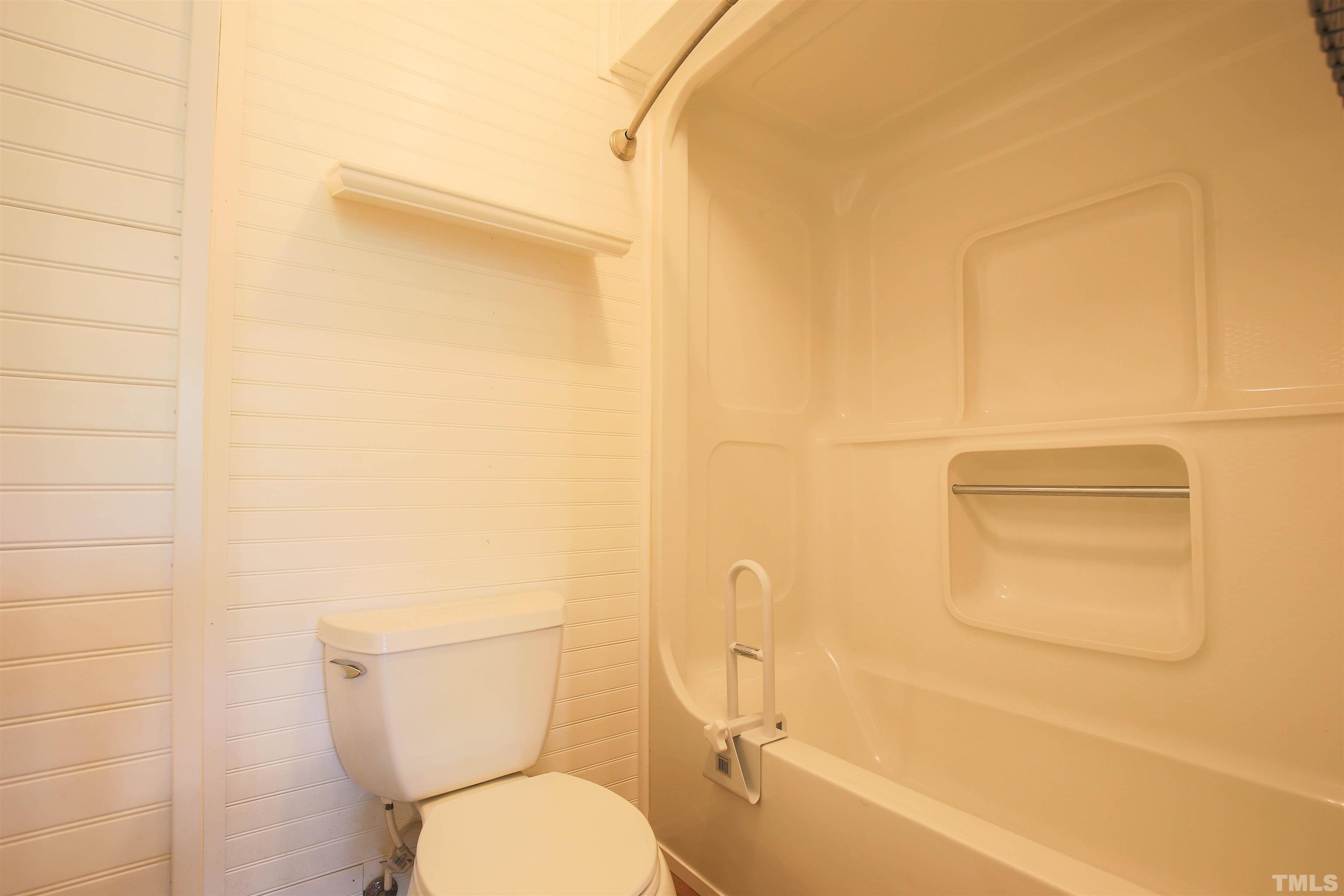 1507 Clermont Road, Unit T23 Durham, NC 27713 - Photo 19 of 24 a bathroom with a toilet and a shower