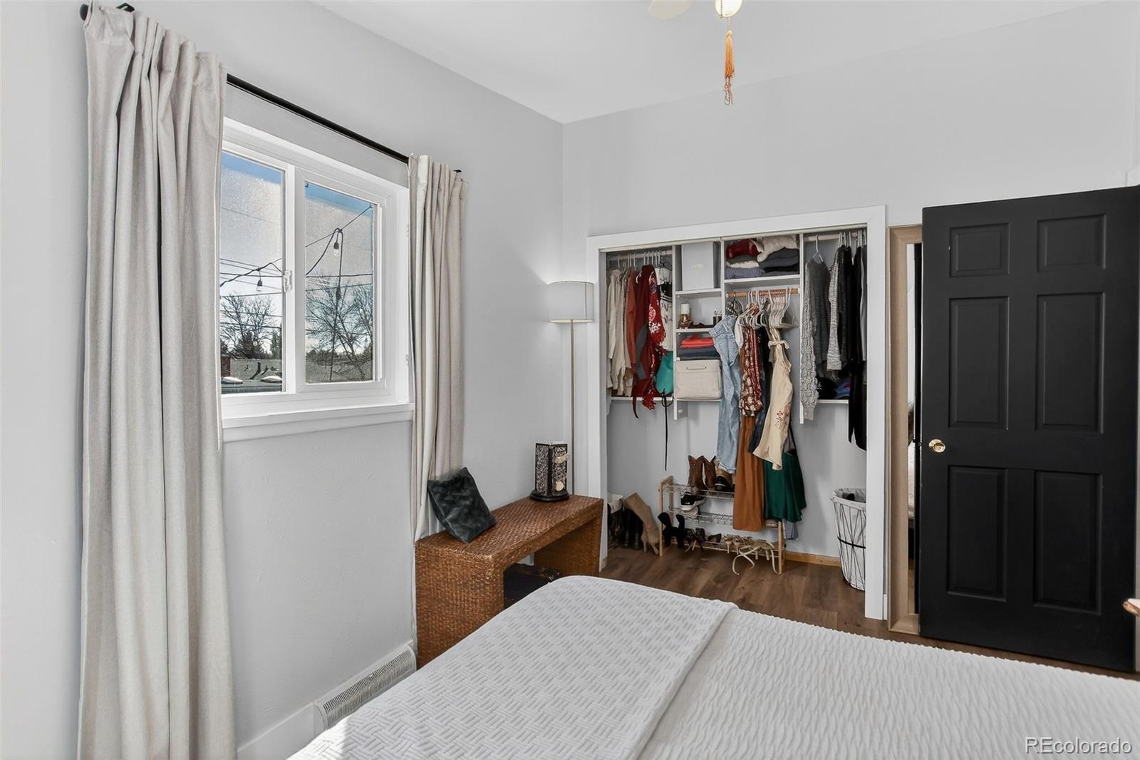 490 Quentin Street Aurora, CO 80011 - Photo 22 of 38 a view of a bedroom with gym equipment