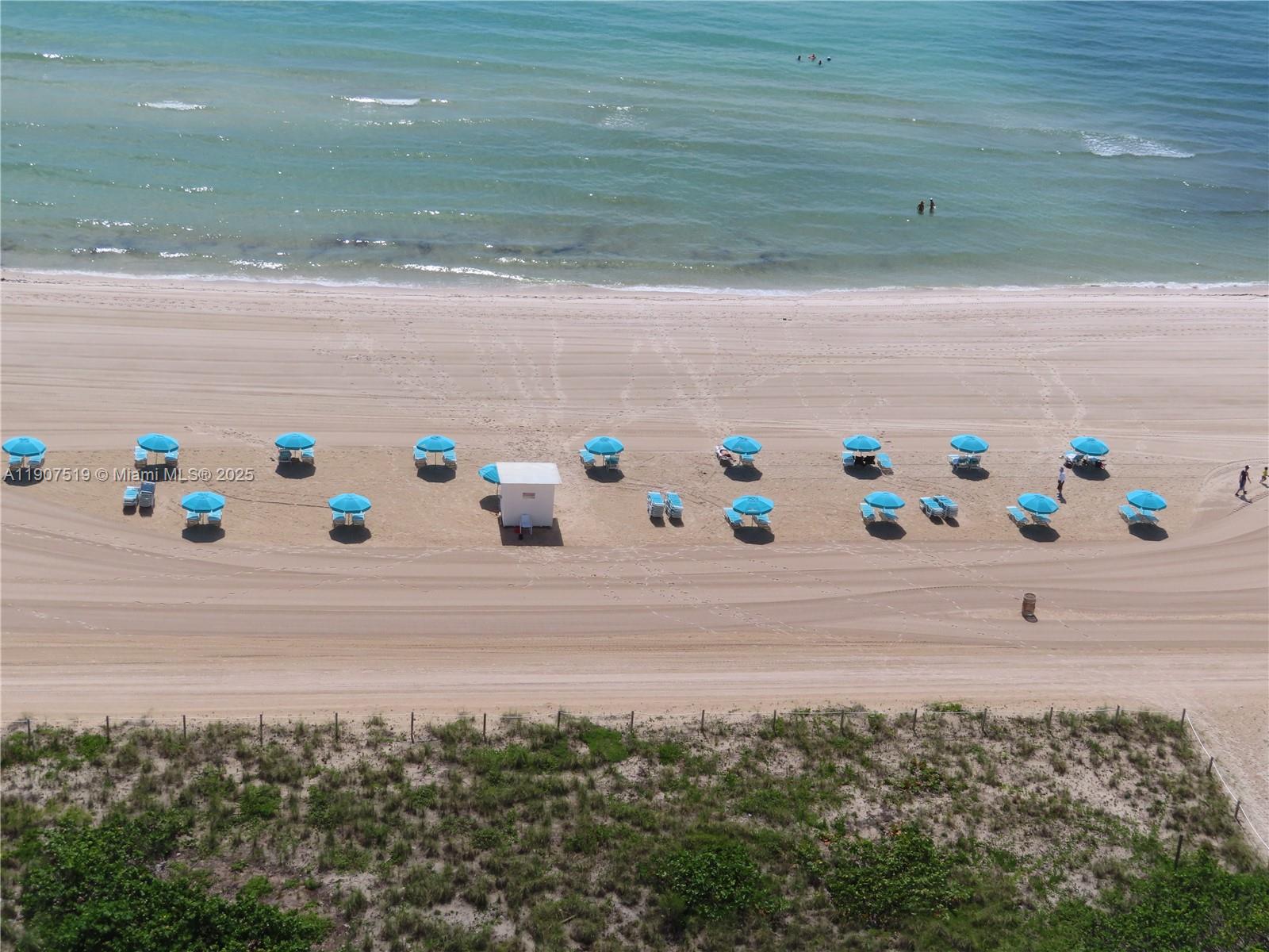5701 Collins Avenue, Unit 304 Miami Beach, FL 33140 - Photo 31 of 42 a bathroom with a bathtub and a sink