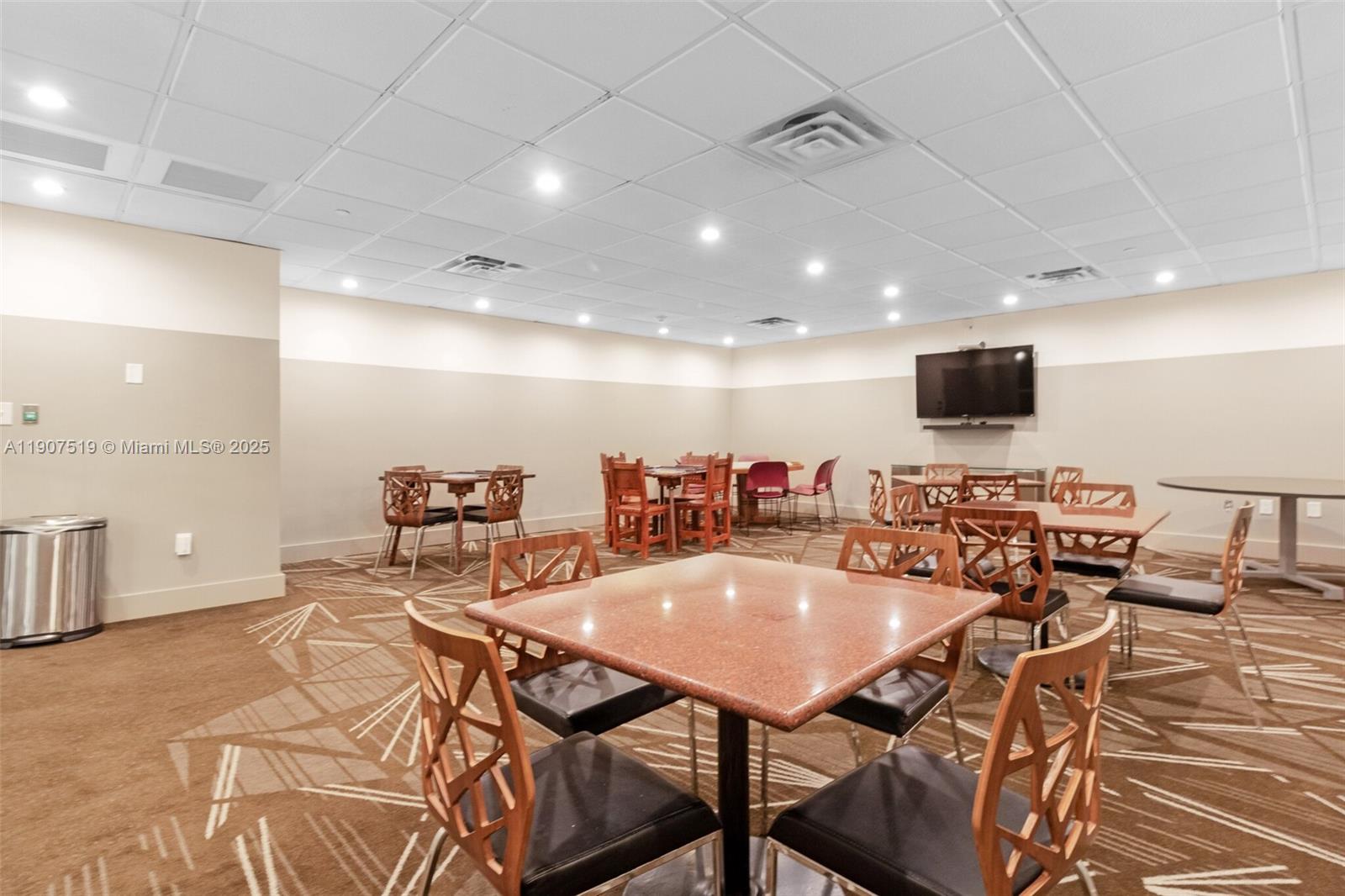 5701 Collins Avenue, Unit 304 Miami Beach, FL 33140 - Photo 42 of 42 a view of a dining room with furniture