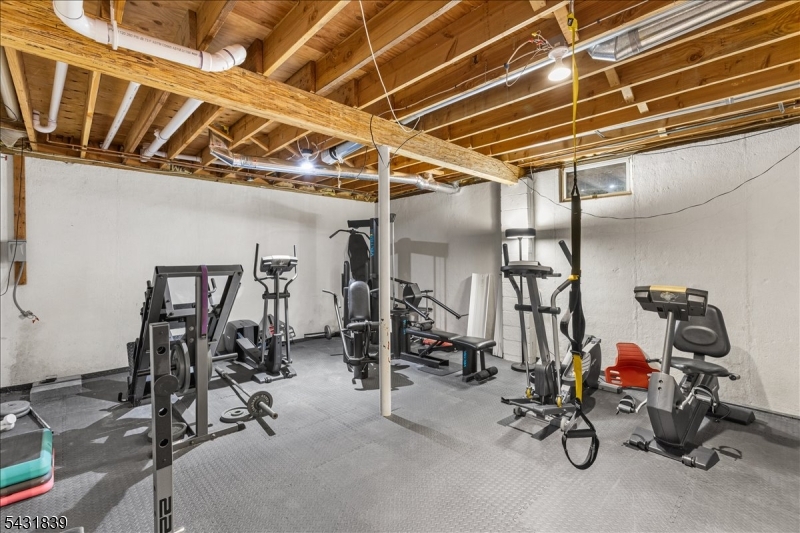 15 Spring Hunter Court Andover, NJ 07821 - Photo 38 of 49 a view of a room with gym equipment