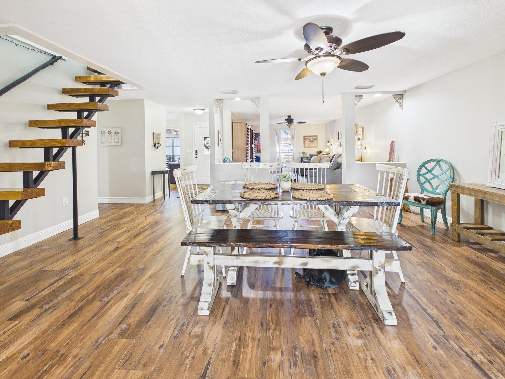 755 Southwest 85th Avenue Okeechobee, FL 34974 - Photo 26 of 99 a view of a dining room with furniture and wooden floor