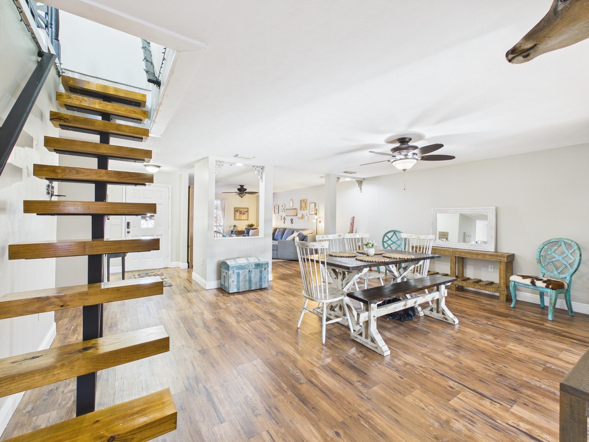 755 Southwest 85th Avenue Okeechobee, FL 34974 - Photo 73 of 99 a living room with furniture and a wooden floor