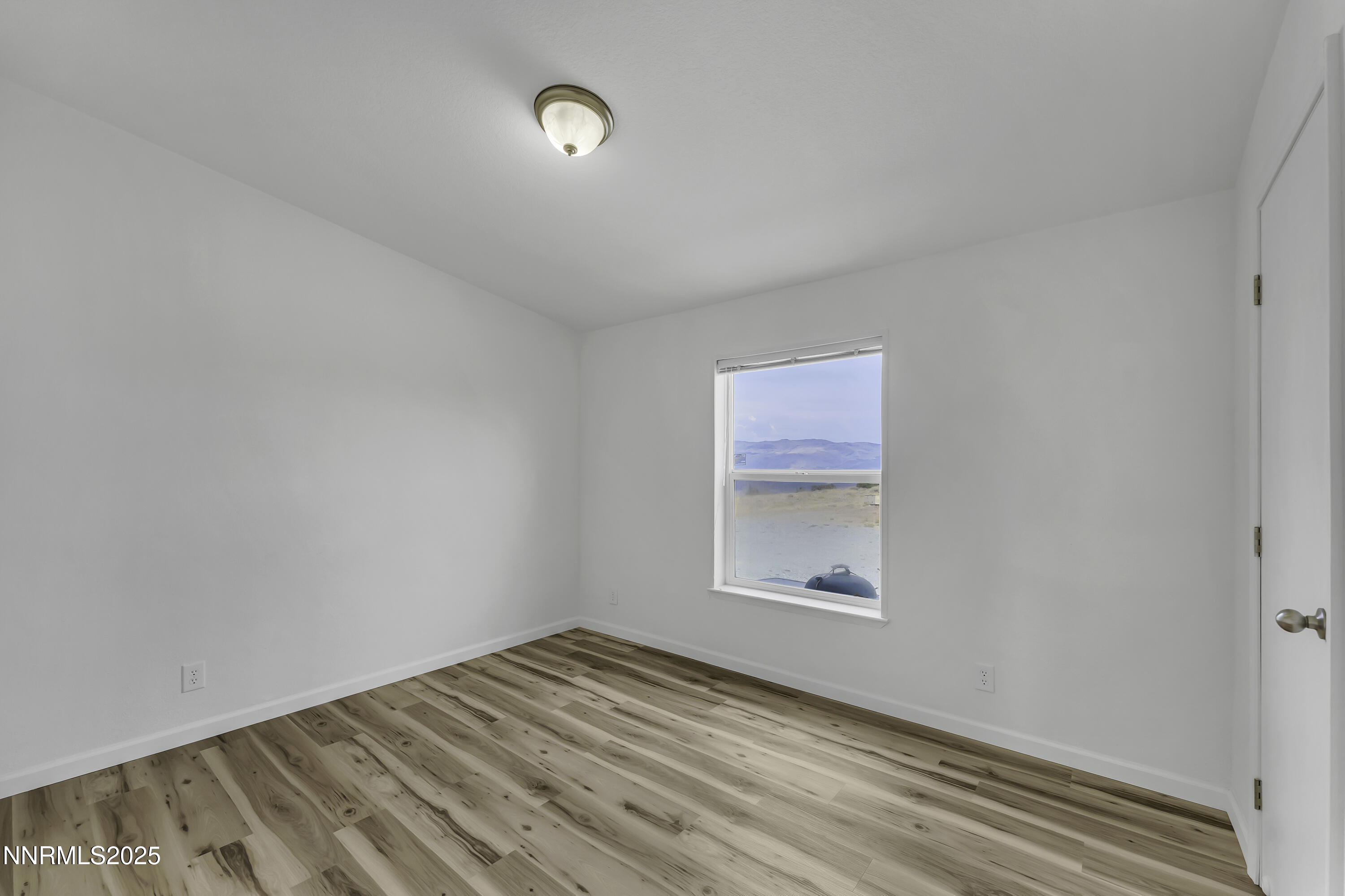 90 Curnow Canyon Road Reno, NV 89510 - Photo 22 of 63 an empty room with a window