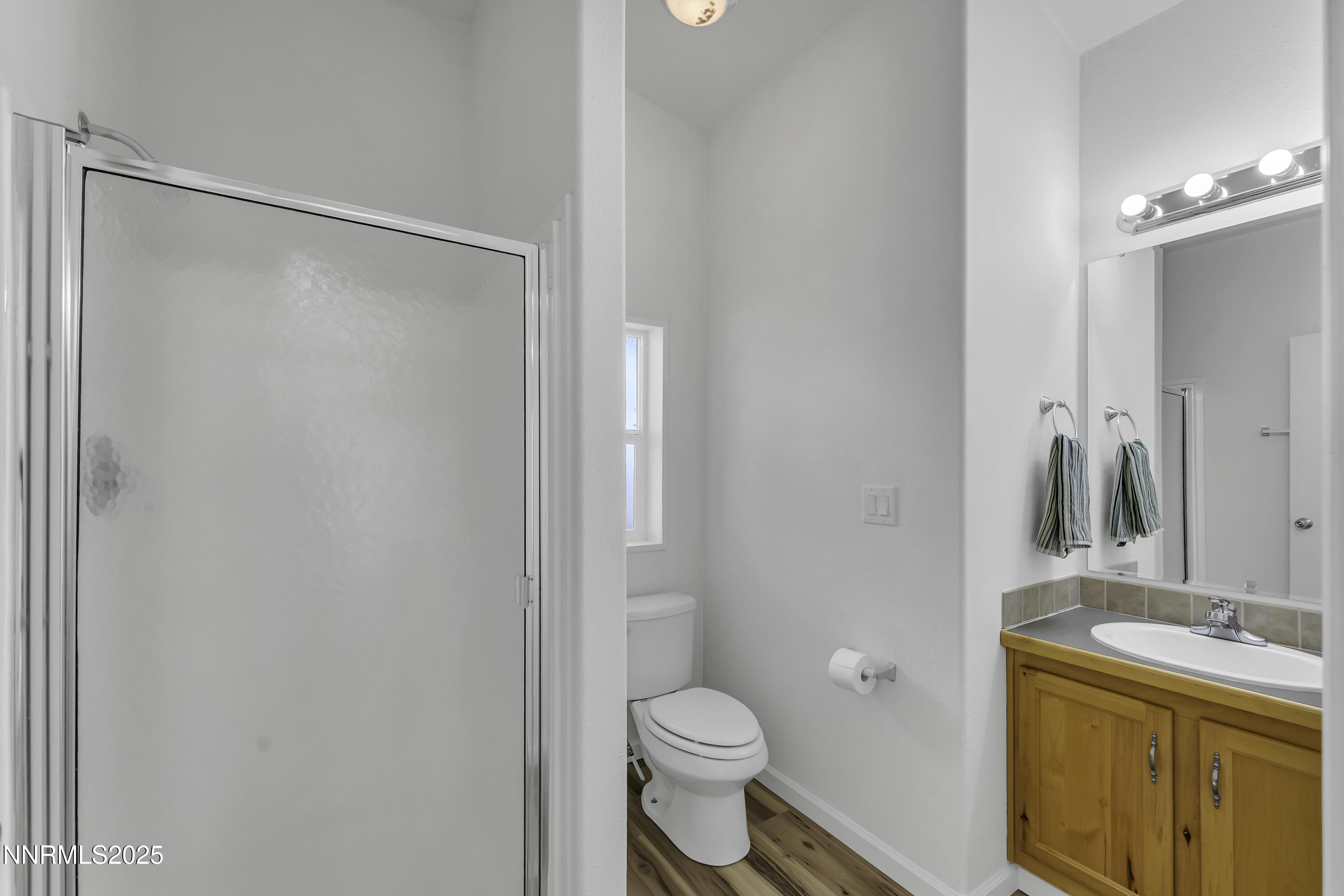 90 Curnow Canyon Road Reno, NV 89510 - Photo 24 of 63 a bathroom with a granite countertop sink toilet and shower