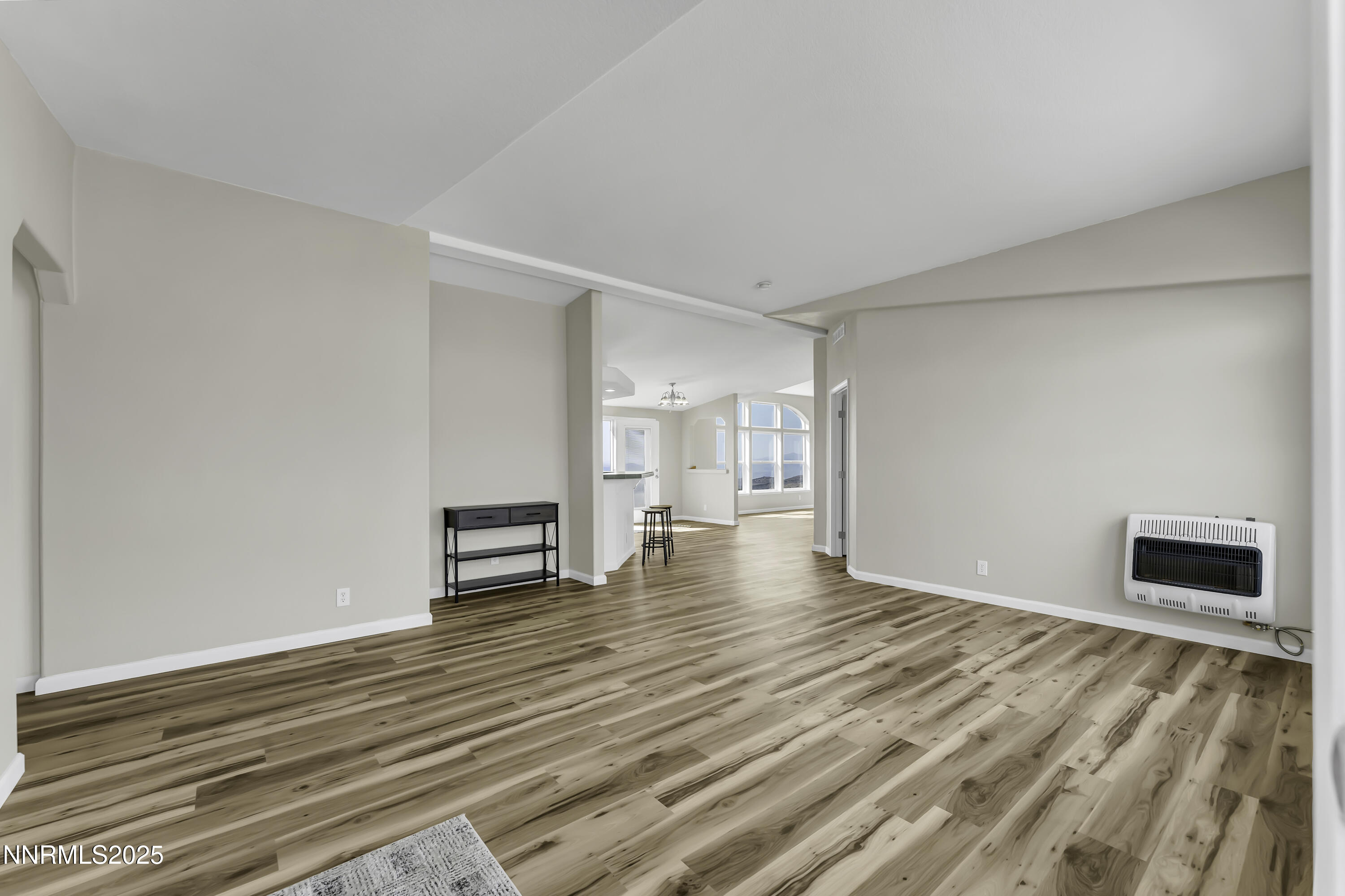 90 Curnow Canyon Road Reno, NV 89510 - Photo 4 of 63 a view of empty room with wooden floor and fireplace