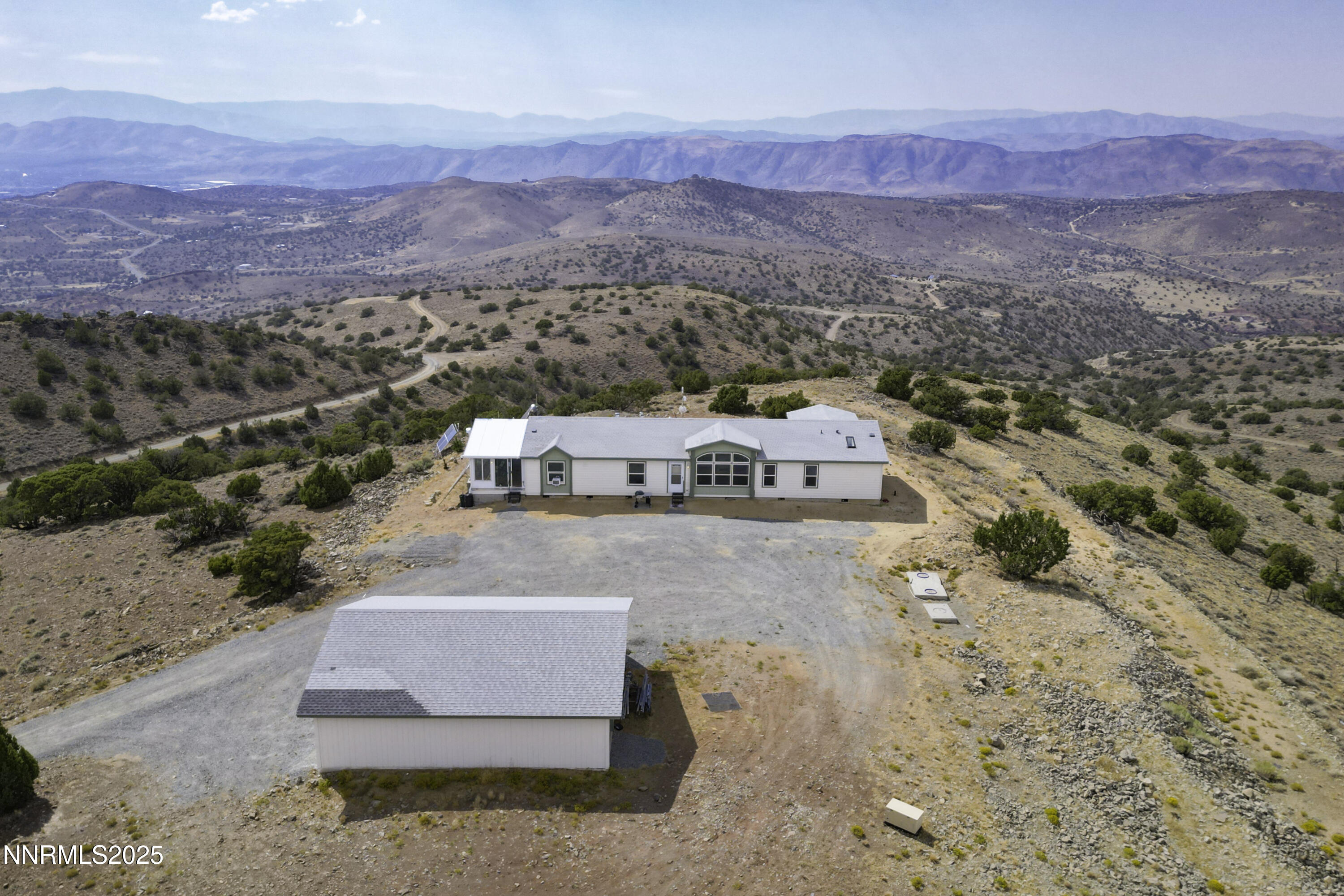 90 Curnow Canyon Road Reno, NV 89510 - Photo 41 of 63 a view of city and mountain