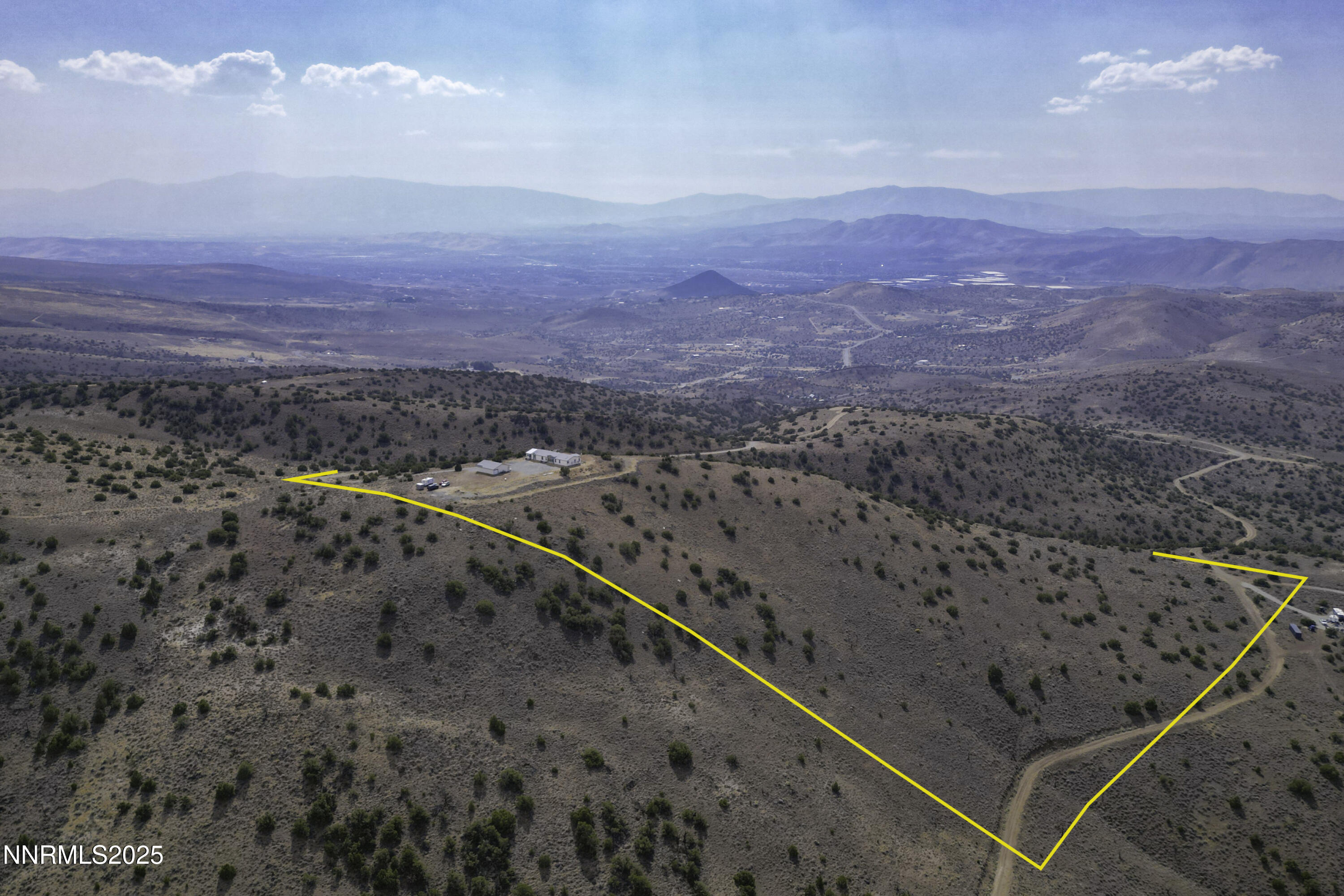 90 Curnow Canyon Road Reno, NV 89510 - Photo 50 of 63 a view of a dry yard with mountains in the background