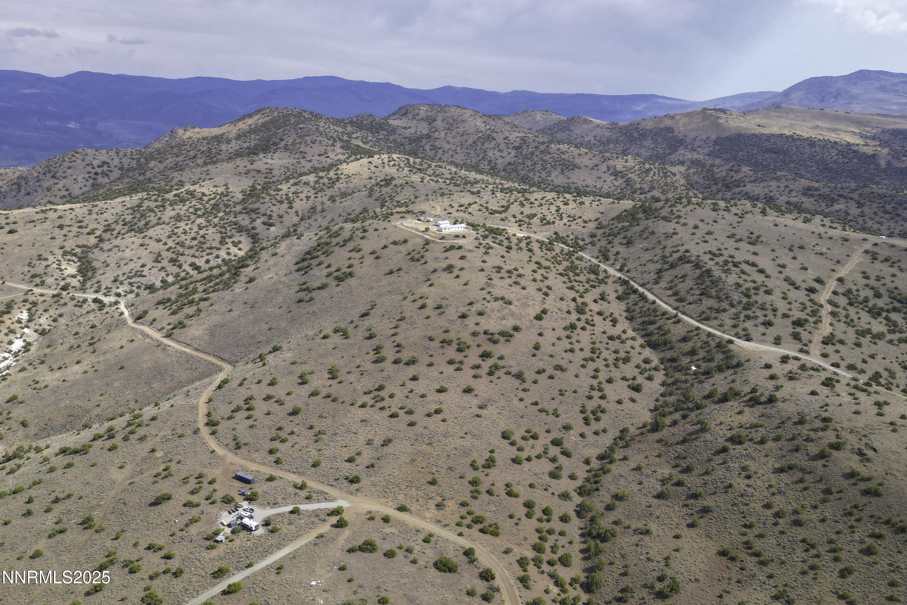 90 Curnow Canyon Road Reno, NV 89510 - Photo 53 of 63 a view of a dry yard with mountains in the background