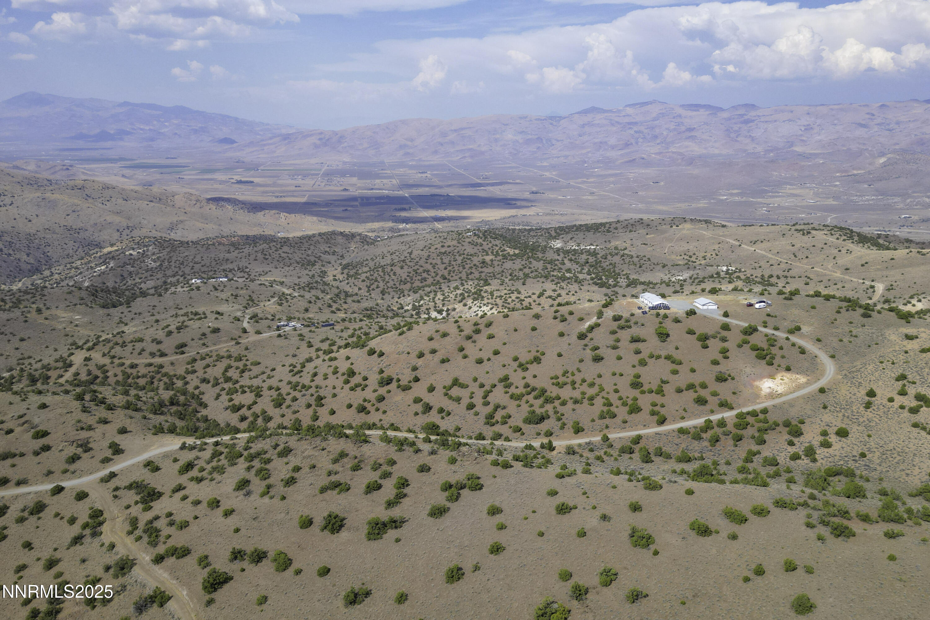 90 Curnow Canyon Road Reno, NV 89510 - Photo 57 of 63 a view of a dry yard with wooden floor and fence