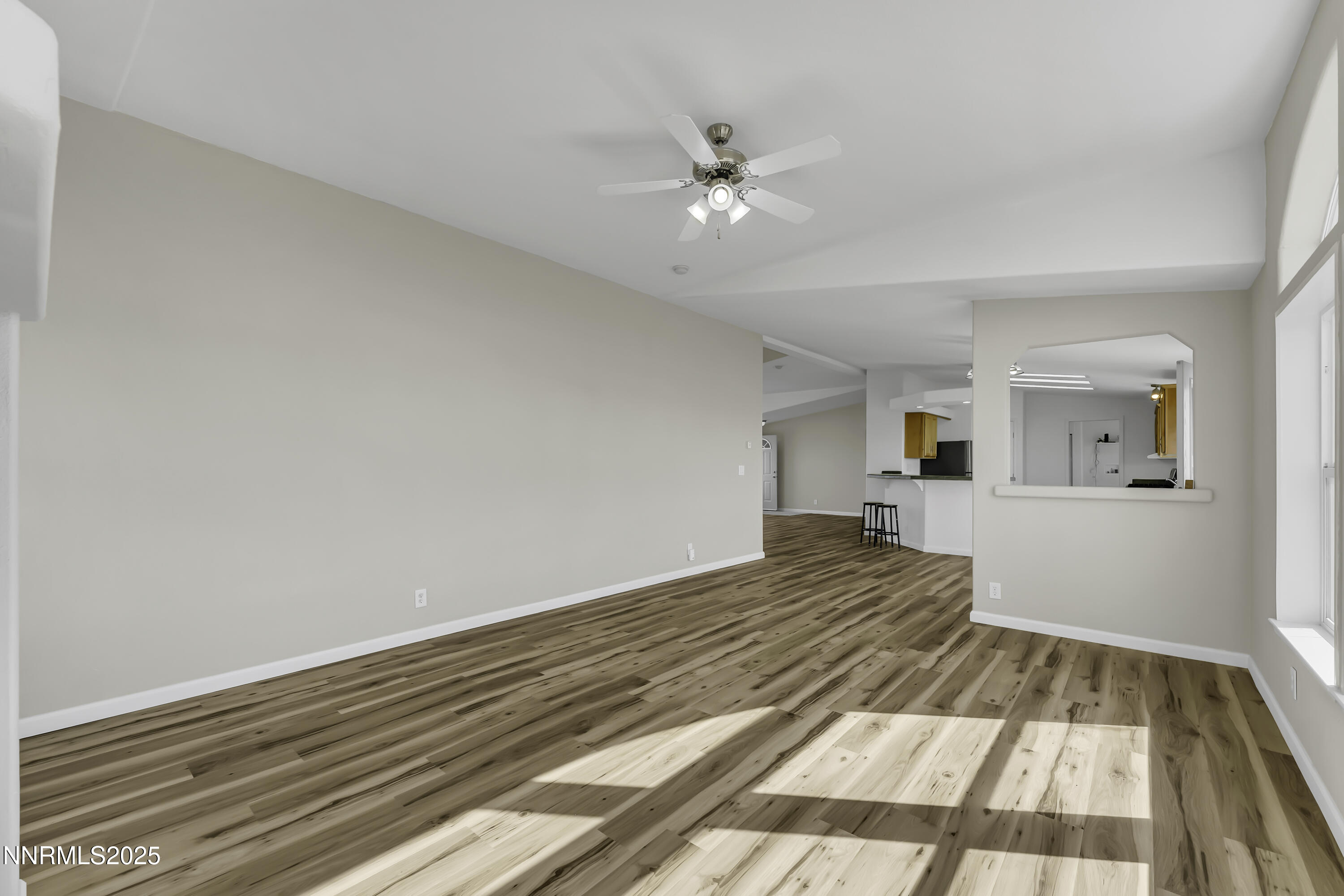 90 Curnow Canyon Road Reno, NV 89510 - Photo 8 of 63 a bedroom with a bed and wooden floor