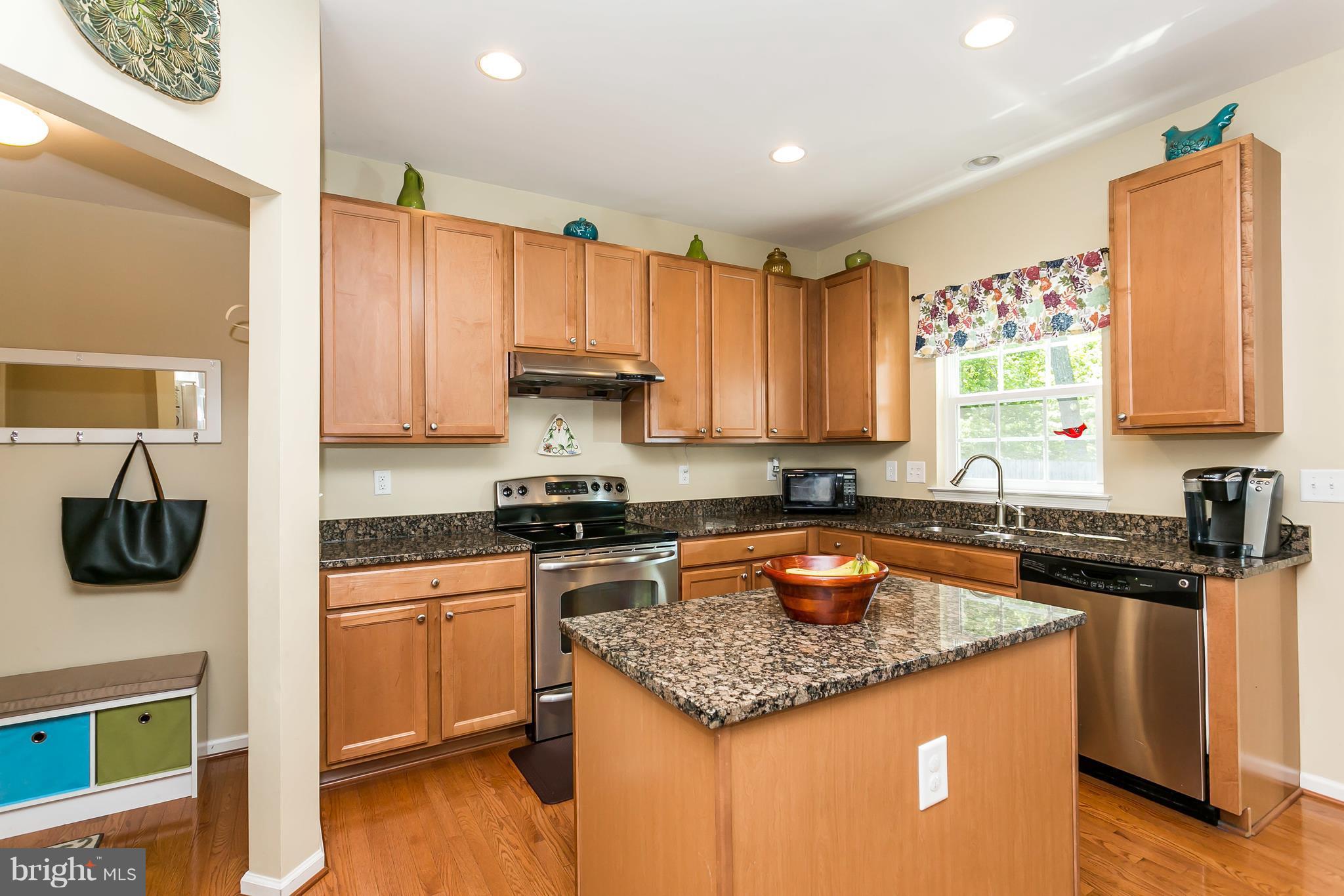 11309 Holter Road White Marsh, MD 21162 - Photo 9 of 29 Kitchen features wood floors and grainte counters