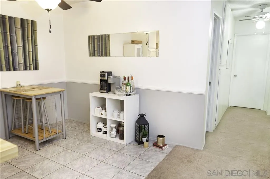 3583 Ruffin Road, Unit 214 San Diego, CA 92123 - Photo 4 of 12 a view of a hallway with workspace